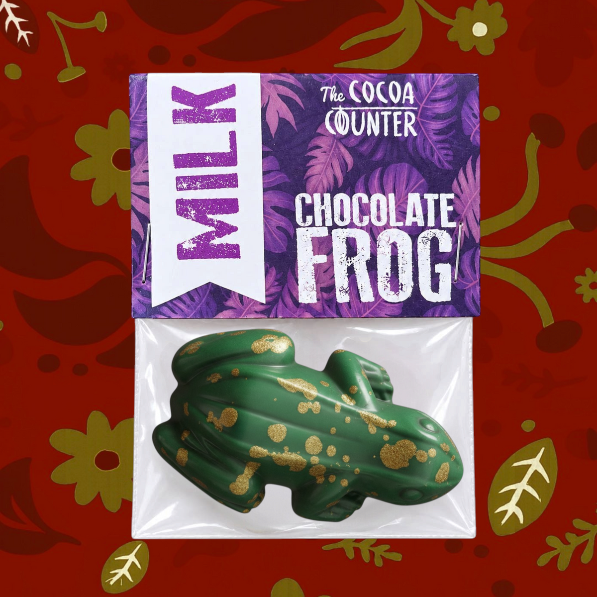 Forager Provisions LTD Cocoa Counter hand-painted milk chocolate frog in green and gold with red spots in retail bag