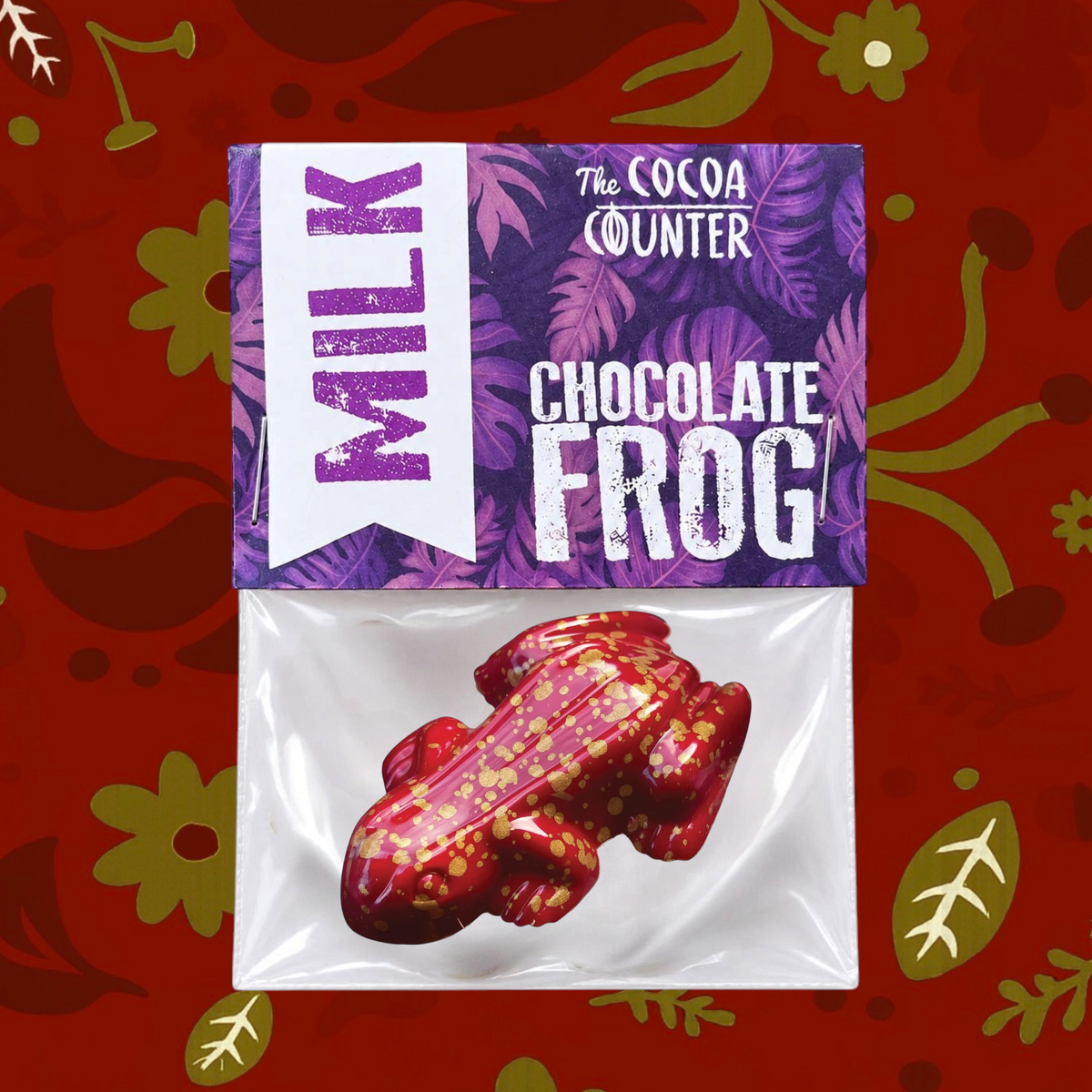 Forager Provisions LTD hand-painted milk chocolate frog in retail packaging with red and gold spots on a yellow base