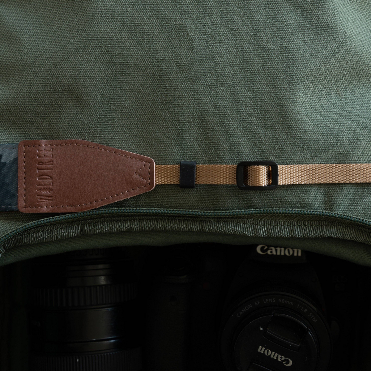 Forager Provisions LTD Wildtree Foggy Forest camera strap with brown synthetic leather end and adjustable webbing