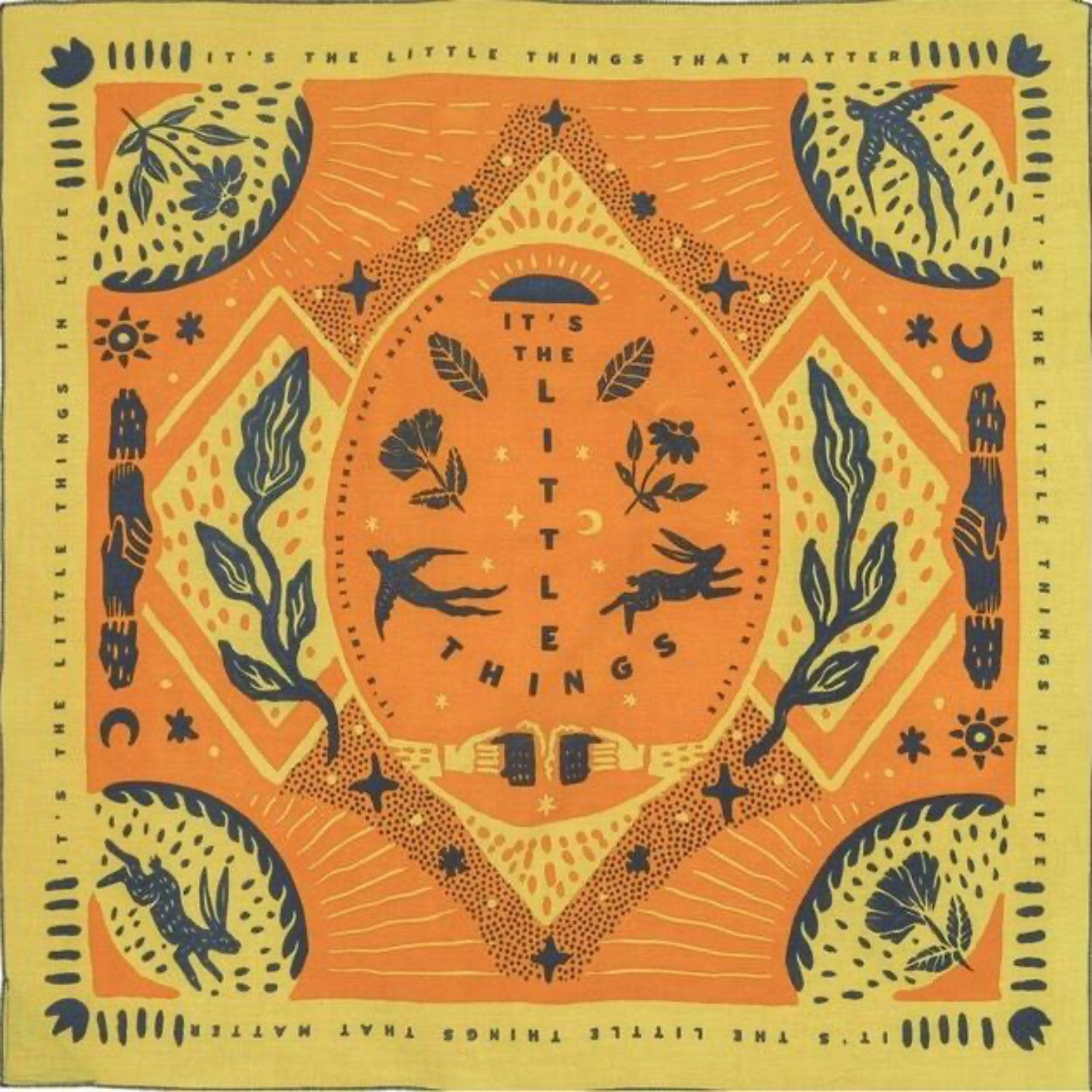 The image showcases the bandana design which includes a reflective motif of an illustrative rabbit, swallow, plants and shaking hands and beer cheering. The colourations are yellow, navy and orange.