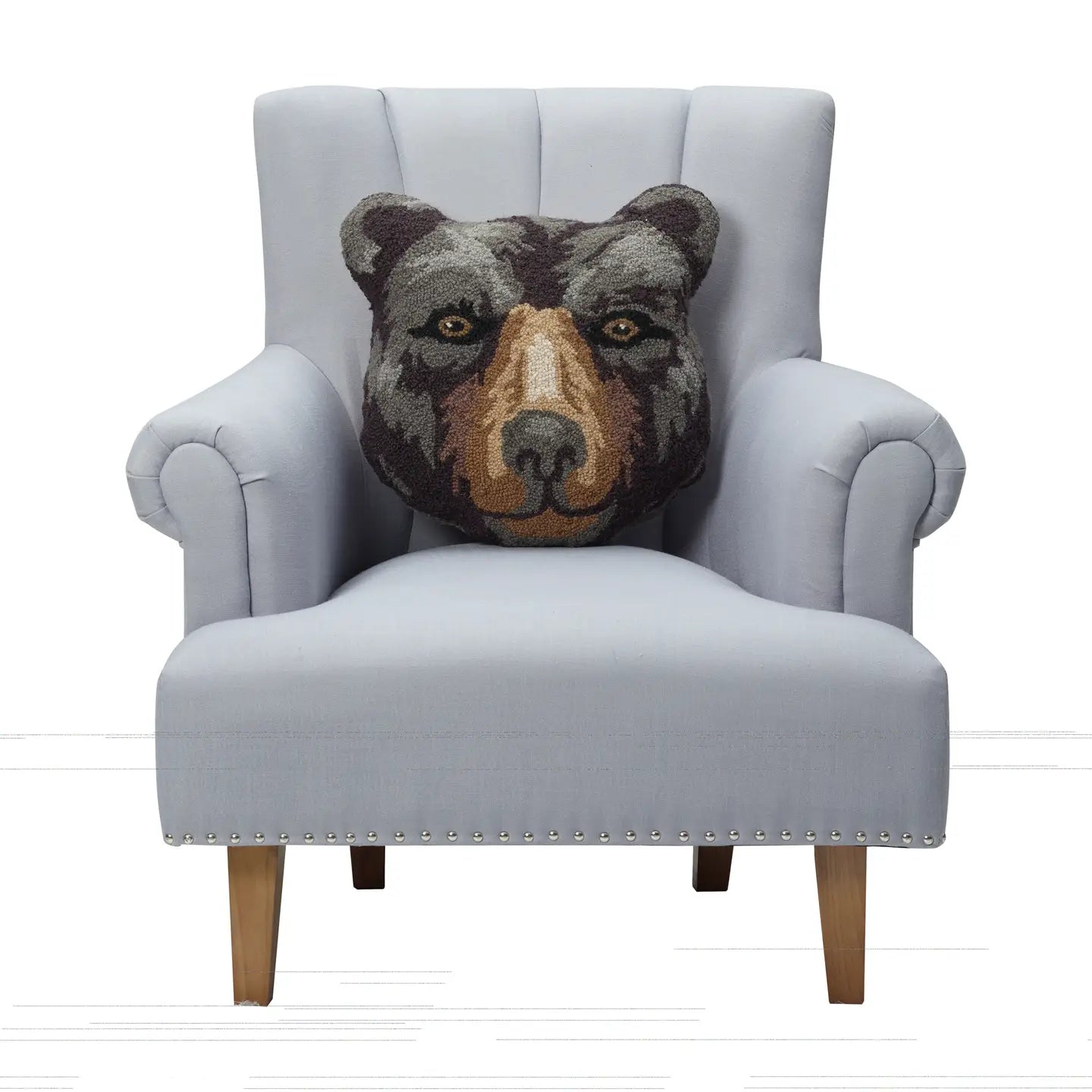 Light gray armchair with cozy Peking Handicraft Black Bear Face Shaped Wool Hook Cushion adds charm to modern home décor.
