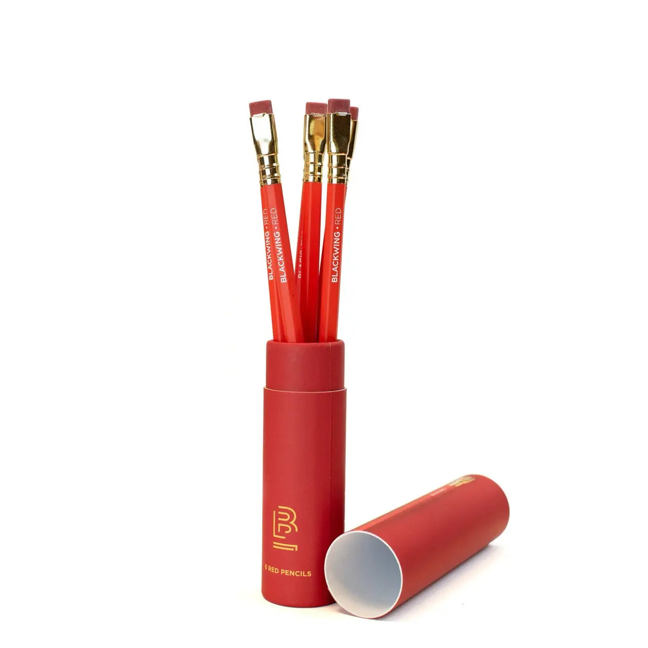 Limited edition Blackwing Red pencils in a red case with gold logo and erasers, collectible set, lid on side. Perfect gift.
