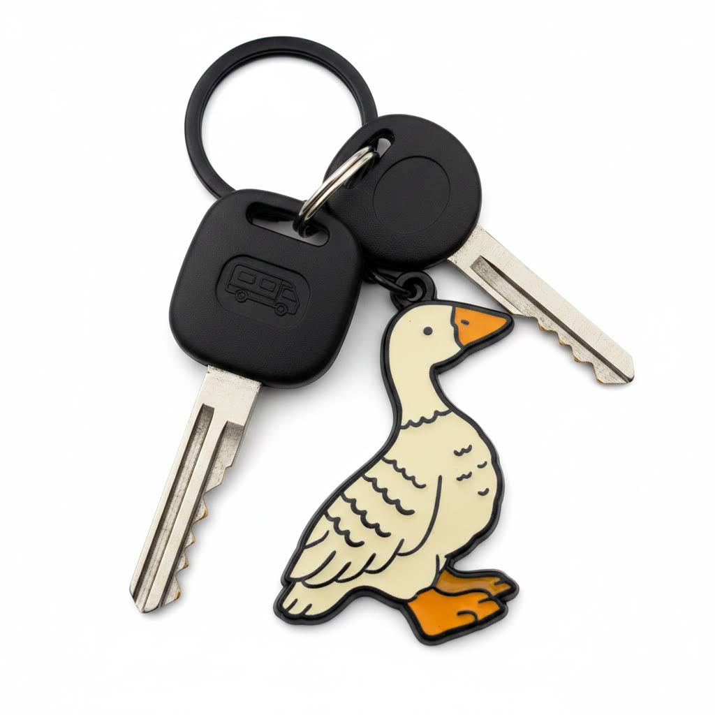 Forager Provisions LTD Stay Home Club Fowl keychain featuring a white goose illustration on a matte black keyring.