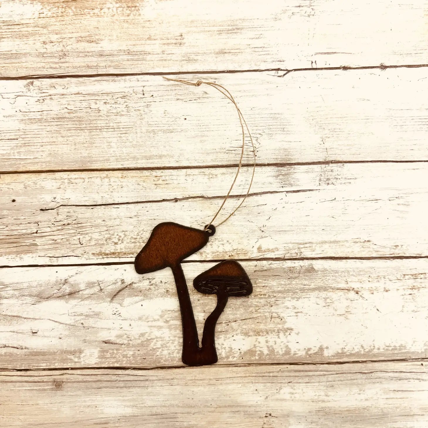 Universal Ironworks Double Tall Mushroom Hanging Decoration, farmhouse style, on rustic white wood. Unique home decor accent.