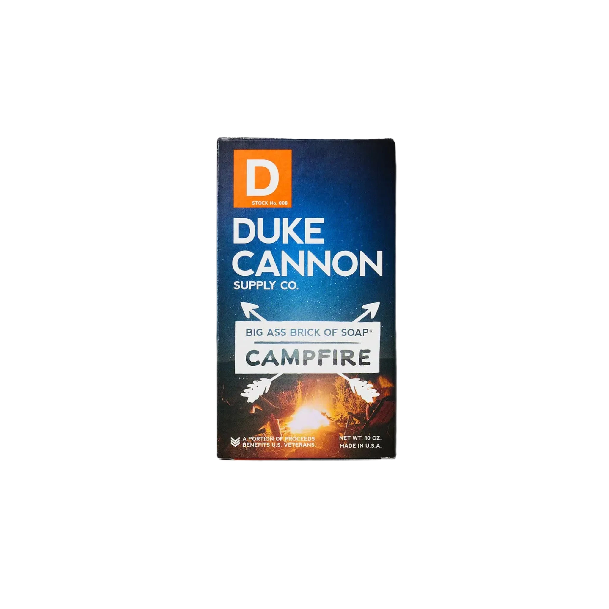 A large bar soap next to boxed packaging labeled "Duke Cannon Big Ass Brick Of Soap - Campfire," emitting a distinct smoky scent, proudly American-made.