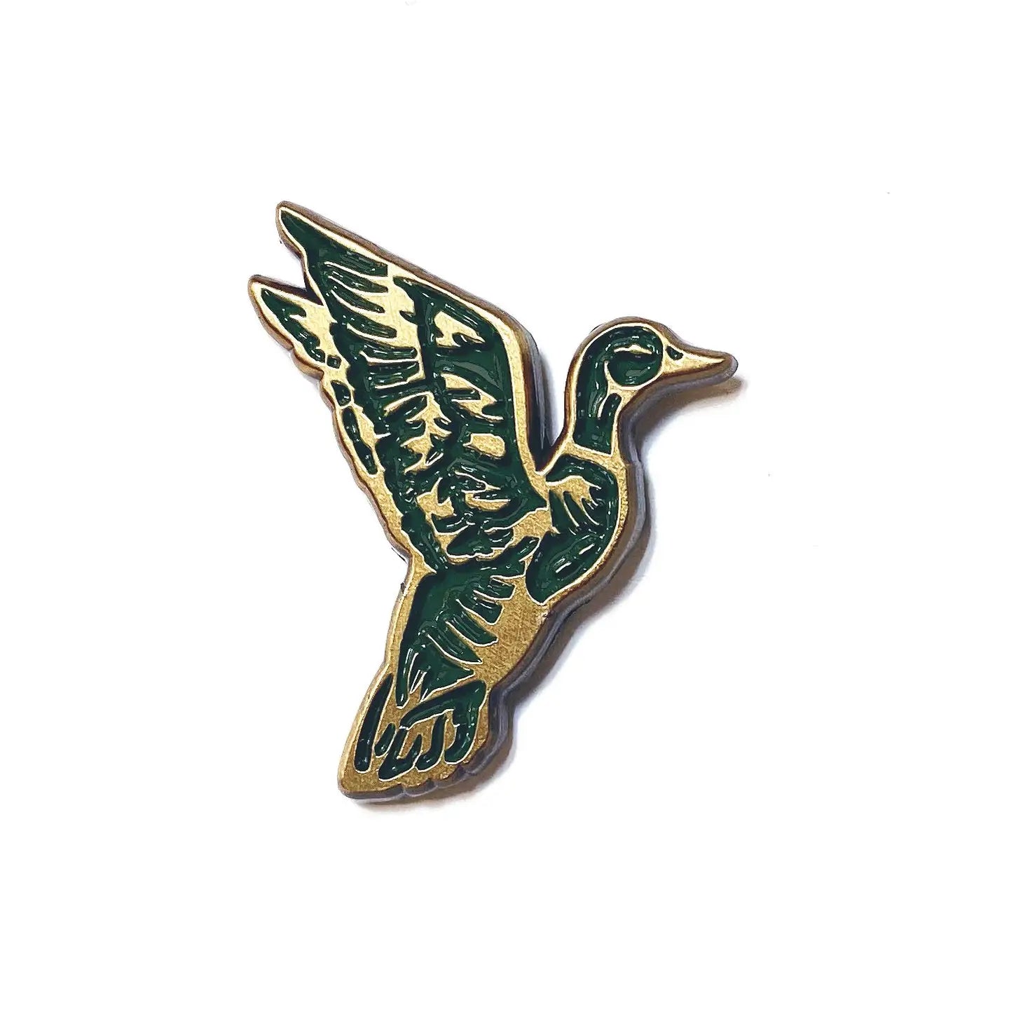 The Wild Wander Mallard Duck Flying Enamel Pin for birdwatchers, unique bird gift, displayed on a clean white background.
