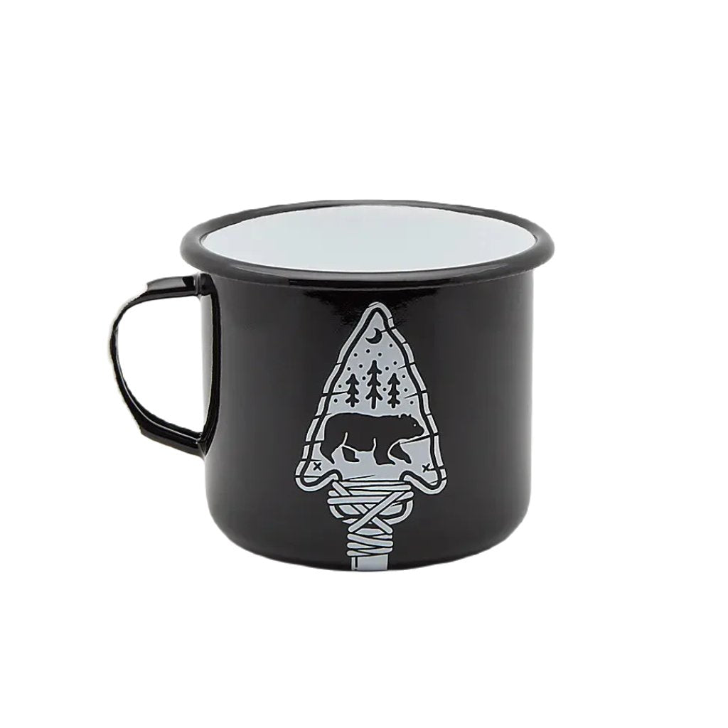 The Emalco Enamelware 16.9oz Enamel Bear & Arrow Mug, in black, features a white design of a bear, trees, and mountains enclosed in a geometric shape on the front. Crafted from durable material, it's perfect for enjoying your favorite drink by the campfire.