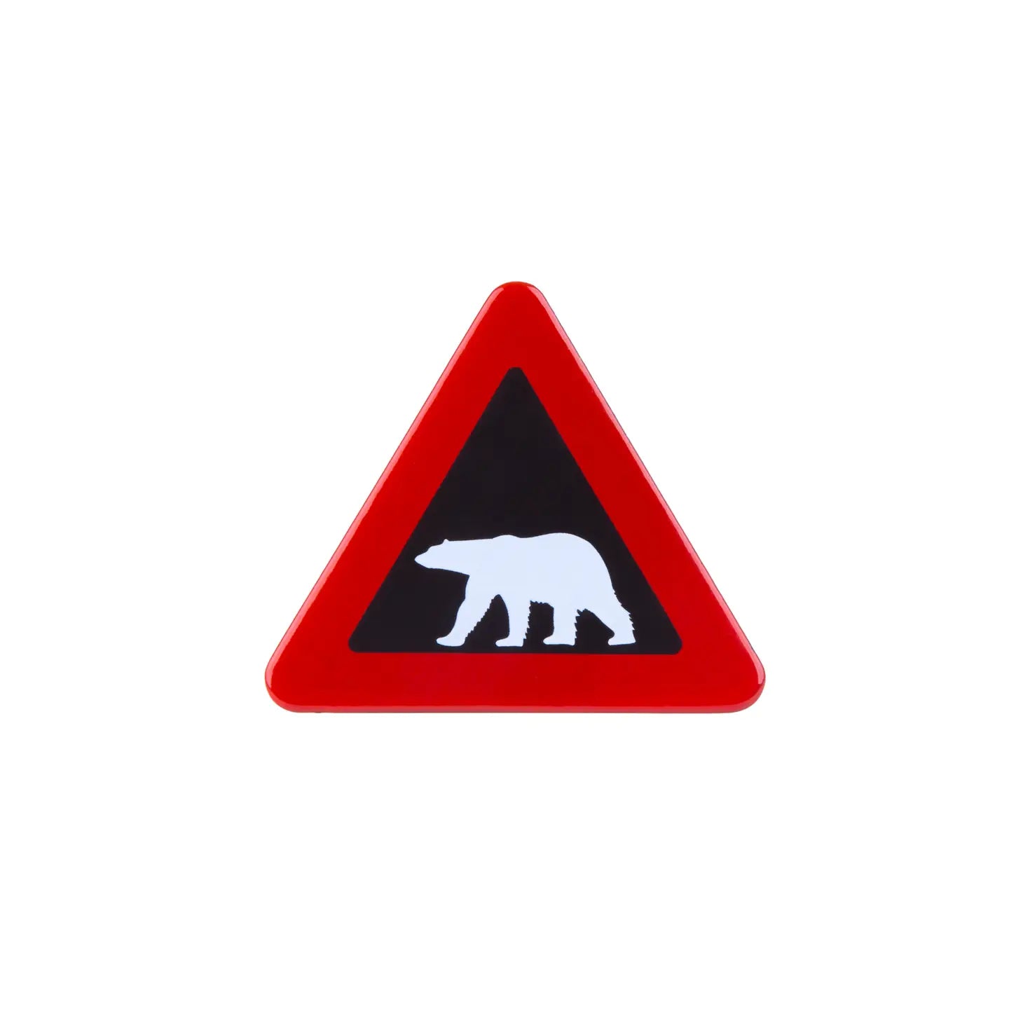 The Emalco Enamelware Polar Bear Magnet is a triangular road sign with a red border and black background, featuring a white bear silhouette warning of bear presence, making it perfect as an enamel fridge magnet for home decor or as a unique Svalbard gift.