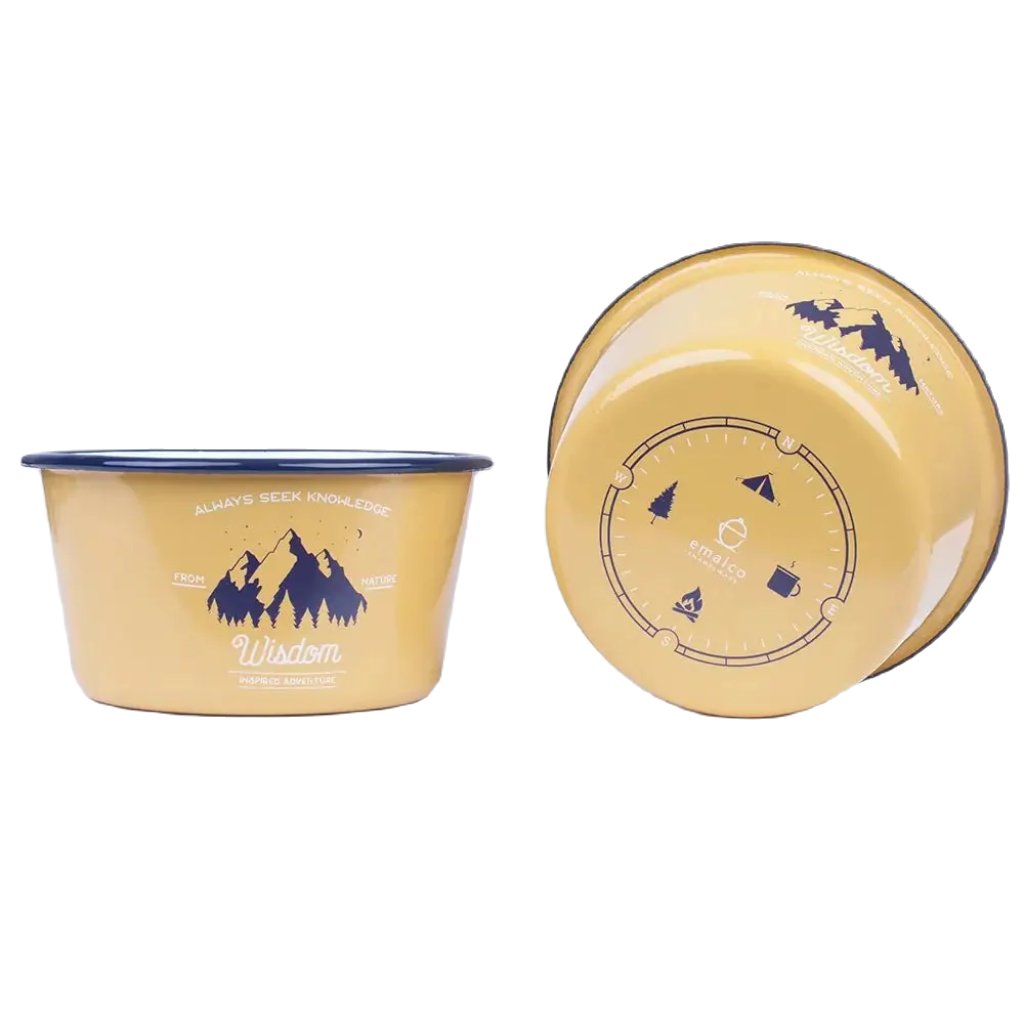 The Emalco Enamelware 25.2oz Enamel Wisdom Bowl is a yellow enamel bowl with a blue rim, adorned with mountain designs and the inspirational texts "Always Seek Knowledge," "From Nature," and "Wisdom Inspired Adventure." This Wisdom Bowl is not only motivational but also crafted from durable material.