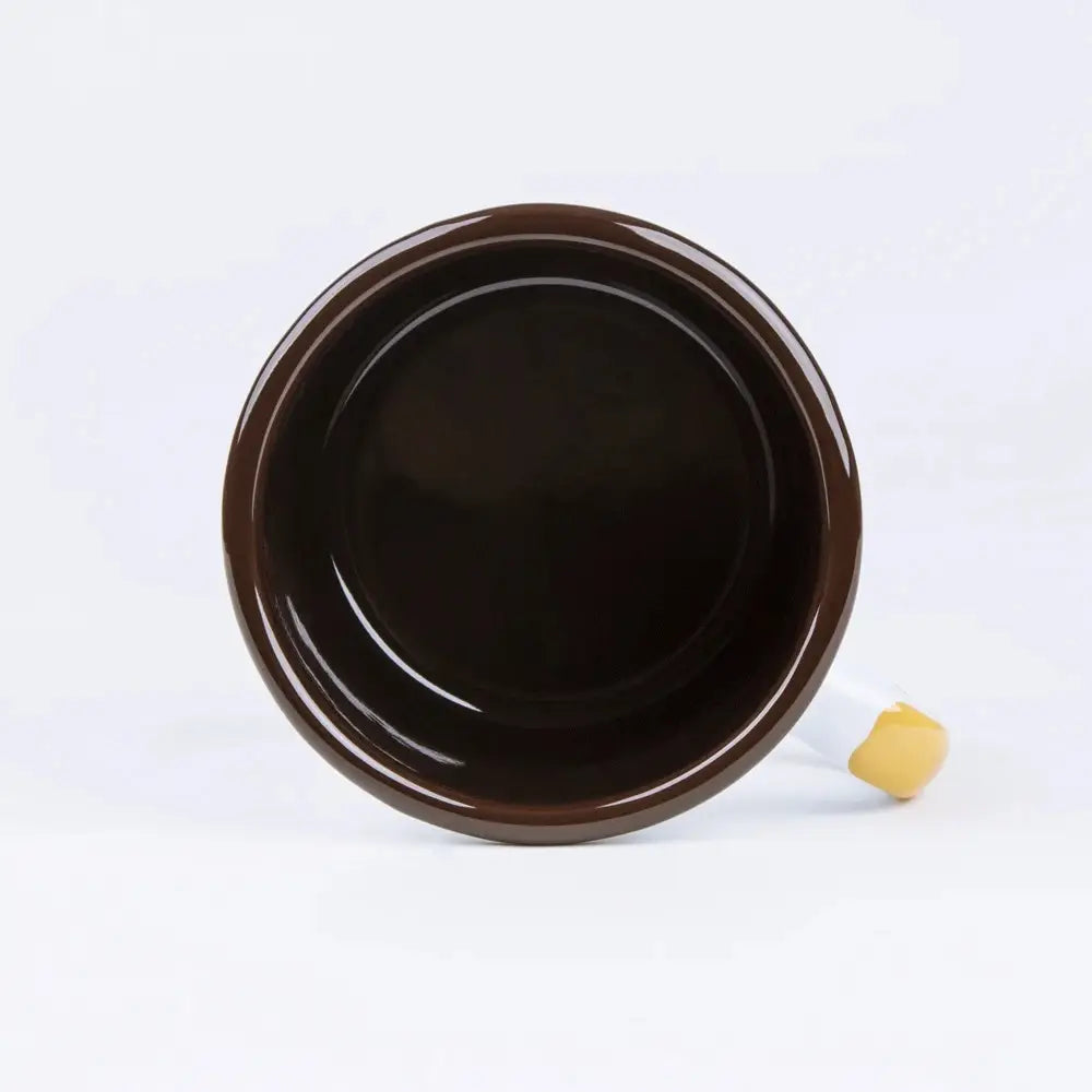 The Emalco Enamelware 22oz Enamel Yellowstone National Park Mug is a white enamel mug featuring a black rim and handle. Its logo showcases bison and bear images, celebrating Yellowstone's history since 1872 and honoring John Muir's profound impact on National Parks.