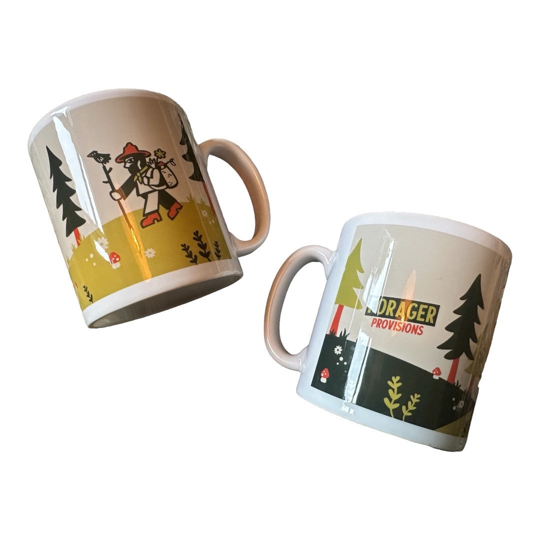Two white Forager Provisions Branded Mugs featuring a whimsical hiker and tree design. One mug depicts a hiker with trekking poles, while the other proudly displays "Drager Provisions," making it an ideal for any Forager Provisions enthusiast.