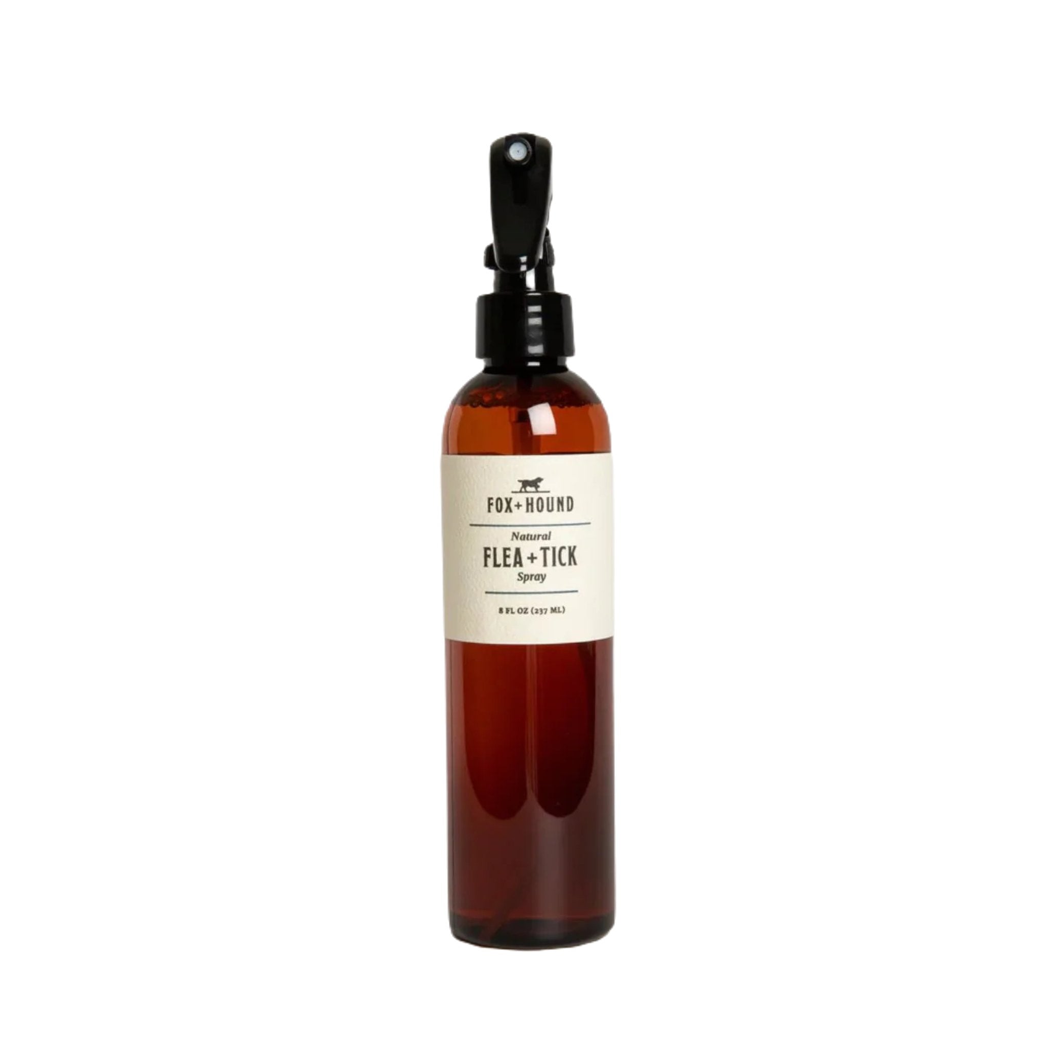 A 237ML brown bottle of Fox + Hound Flea & Tick Spray, equipped with a black spray nozzle and placed against a plain white background, provides effective flea and tick protection through its essential oil blend.