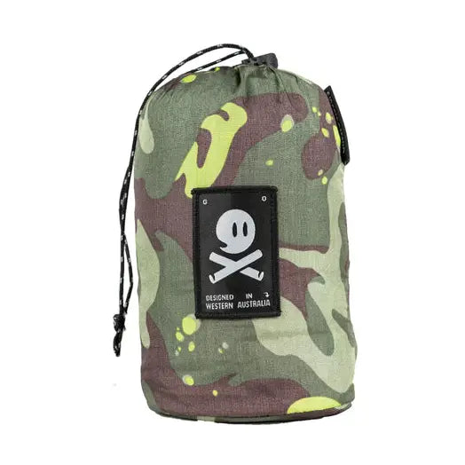 Ghost Outdoors Camo Carry-On Hammock comes in a green camo bag, black patch, white smiley face & crossbones—camping gear essential.