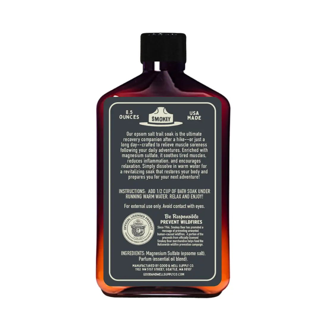 Forager Provisions LTD Good & Well Supply Co Smokey Bear bath soak bottle with citrus and pepper scent label