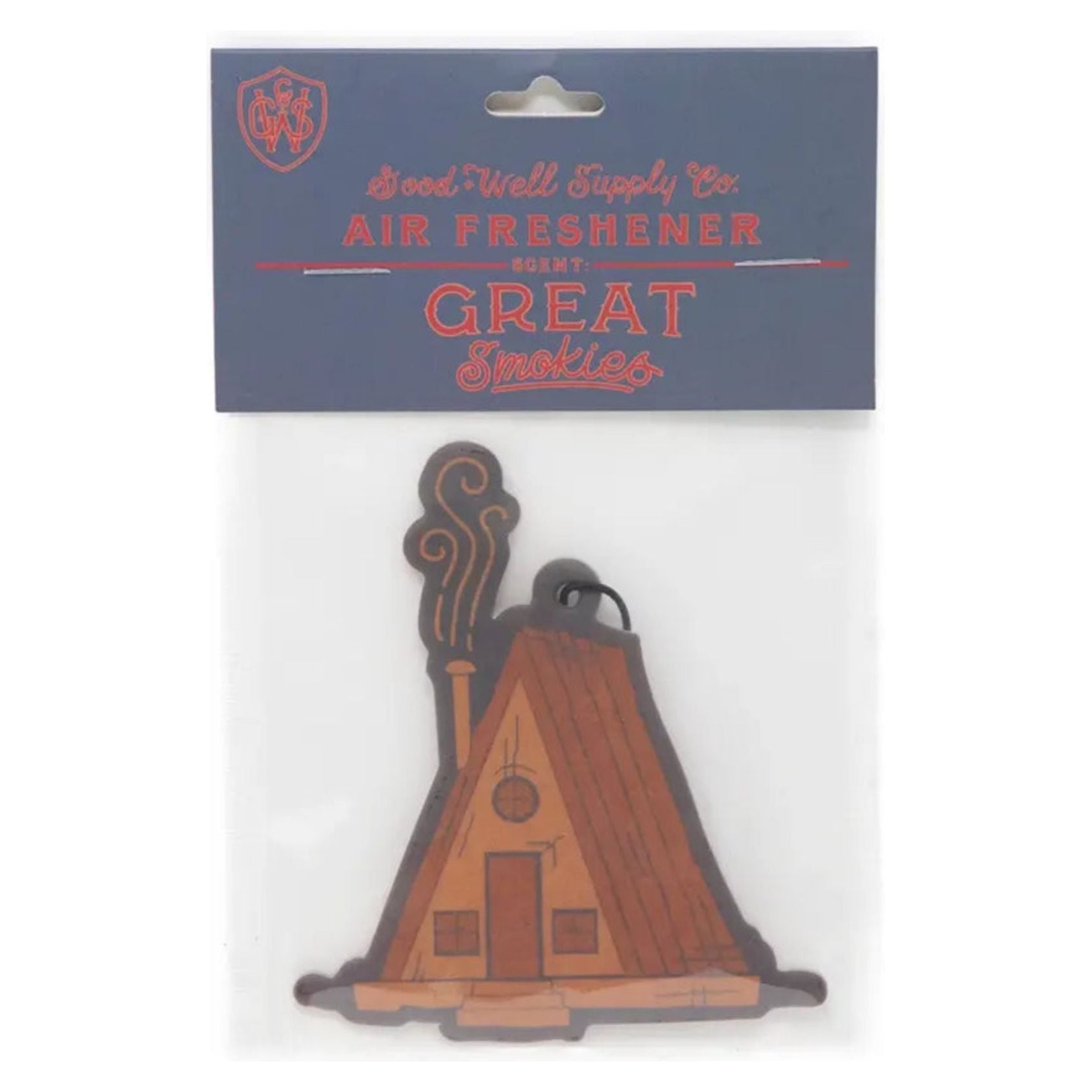 Introducing the Good & Well Supply Co Hangable Air Freshener - Great Smokies: a delightful auto fragrance designed to resemble a wooden cabin with smoke wafting from its chimney. This charming air freshener, perfect for adding a rustic touch to your car, proudly supports the National Park Foundation and is ideal for nature enthusiasts.