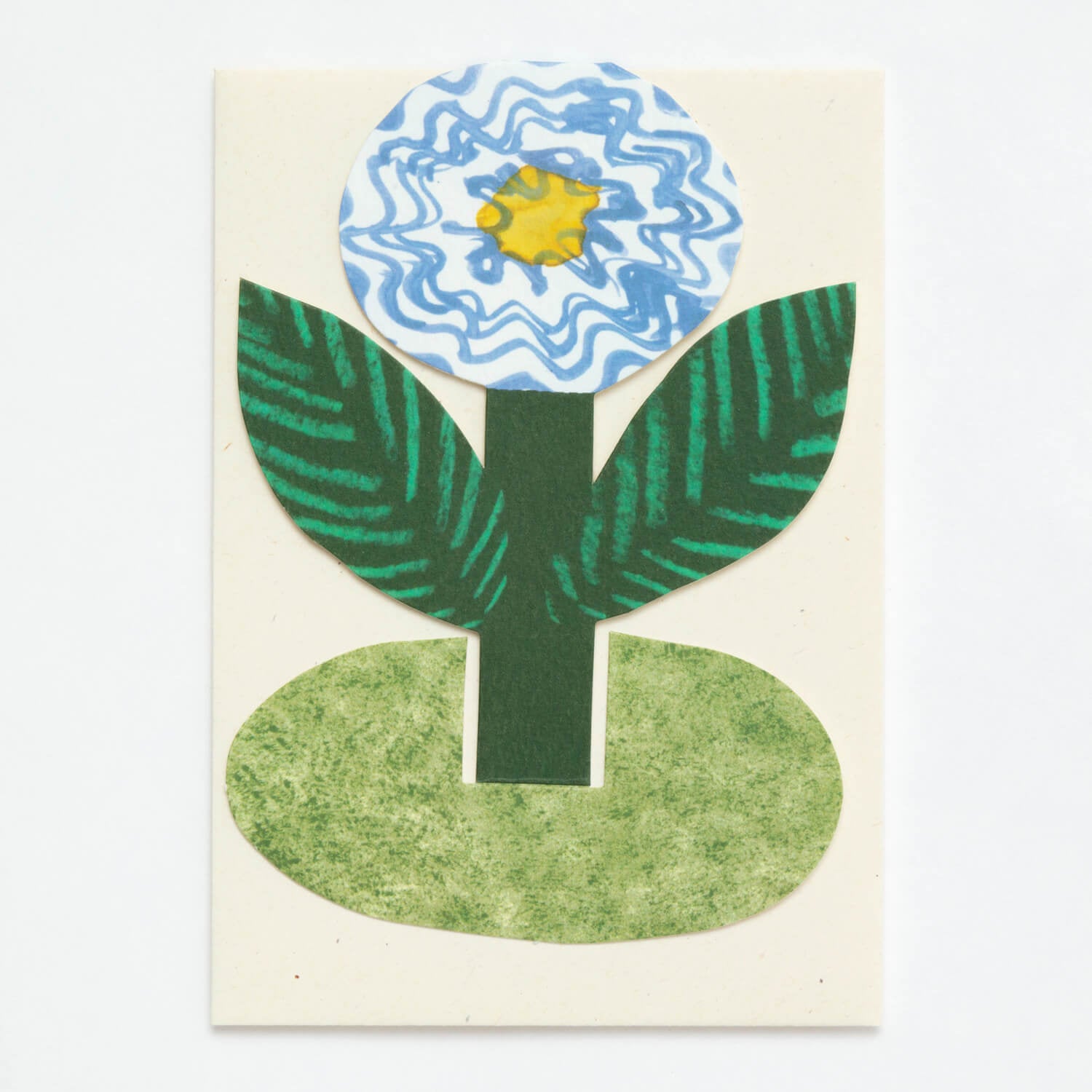 Eco-friendly Hadley Blue Flower Stand Up Card features cream paper, vibrant blue and white flowers, and green leaf accents.