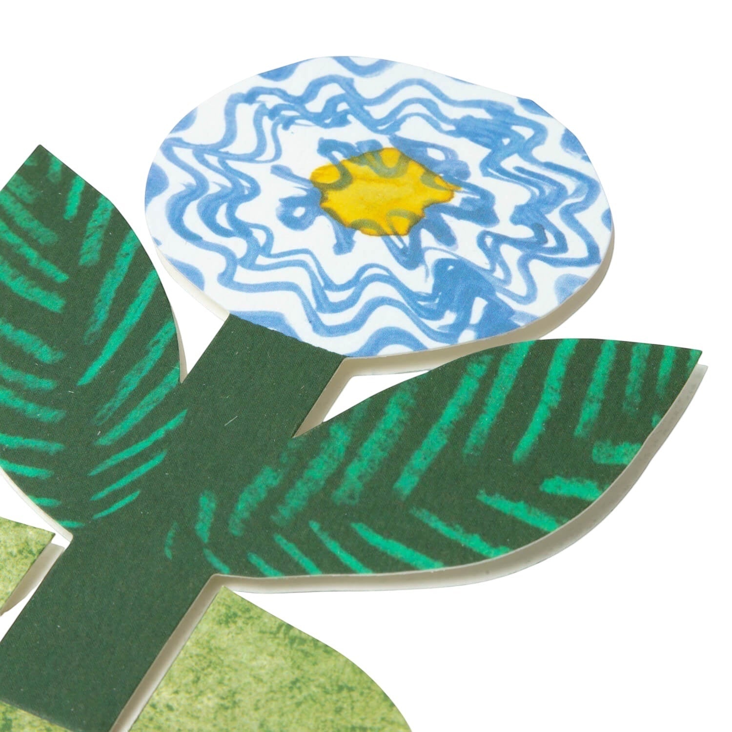 Hadley Blue Flower Stand Up Card with a handmade collage flower, blue and white petals, yellow center, and green leaves gift.