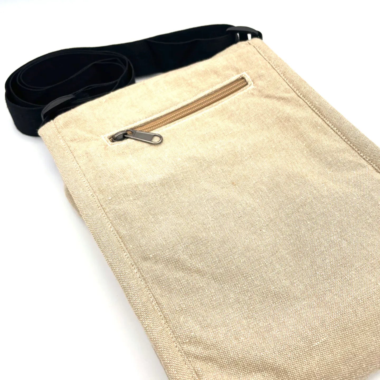 Artisanal beige field trip bag for women, black strap, front zip pocket, red belly dace design—eco-friendly and stylish.