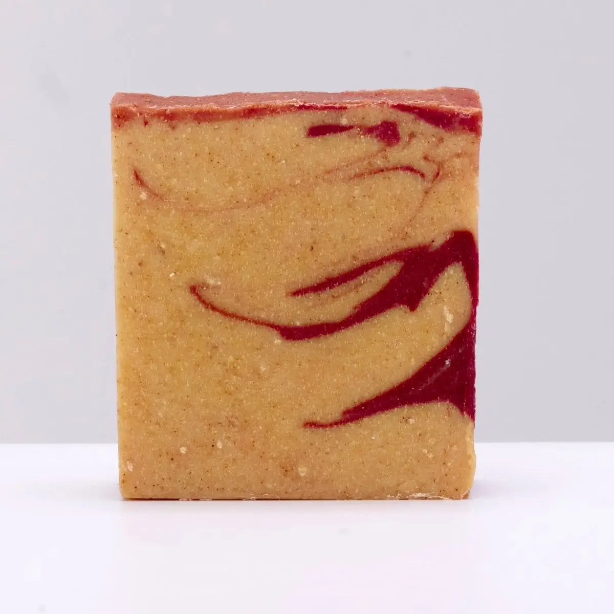 The Black Stuff Soap - The Celtic Tiger: square black soap bar stands upright on white, luxury Irish skincare product.