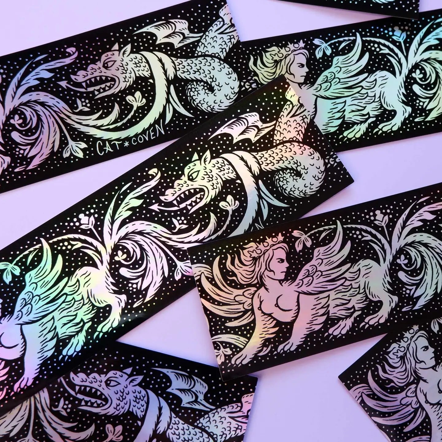 Forager Provisions LTD Cat Coven holographic vinyl stickers featuring a detailed sphinx and dragon fantasy illustration