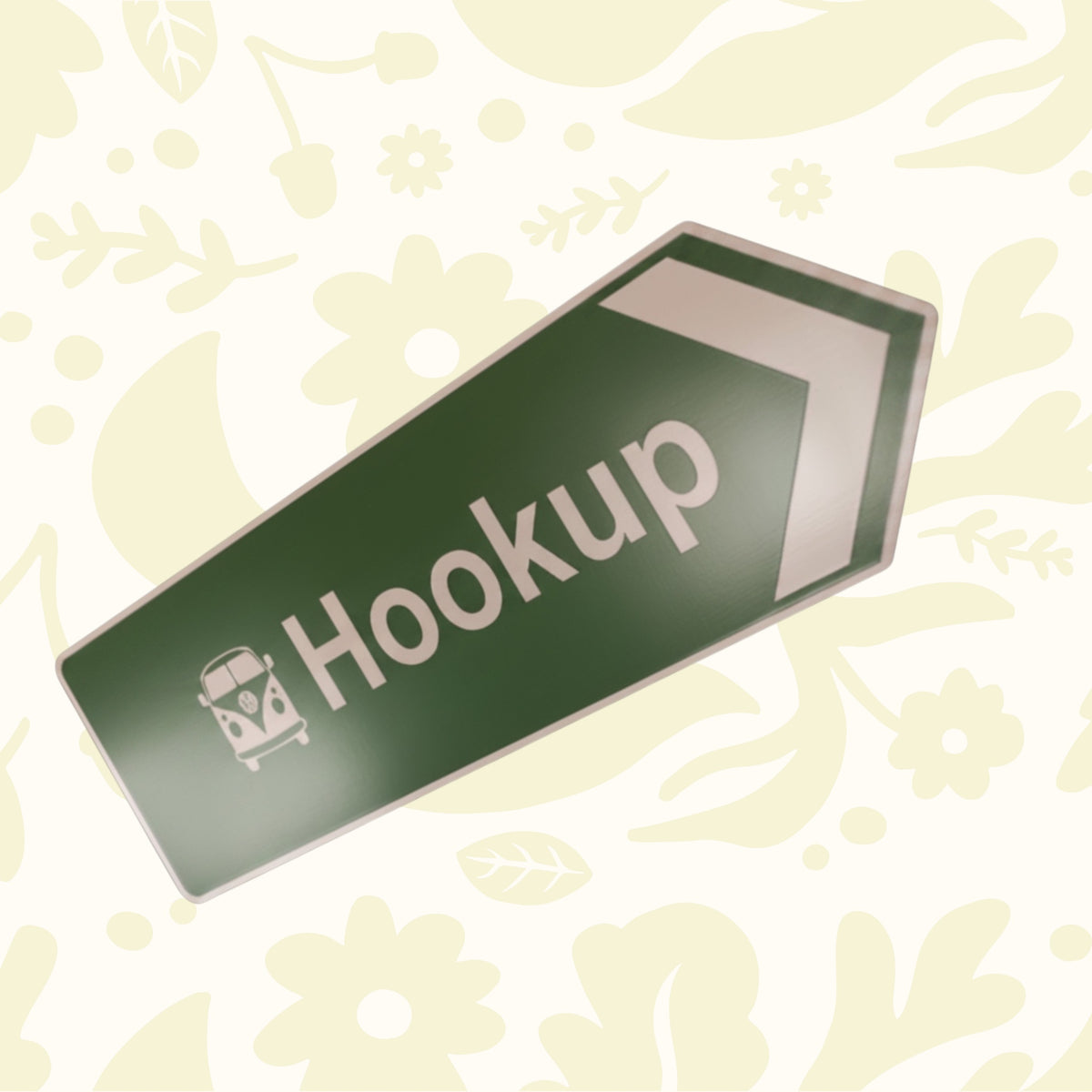 Forager Provisions green aluminum sign (45x15) with âHookupâ, van icon, arrow, floral backdrop. Camping gear decor.