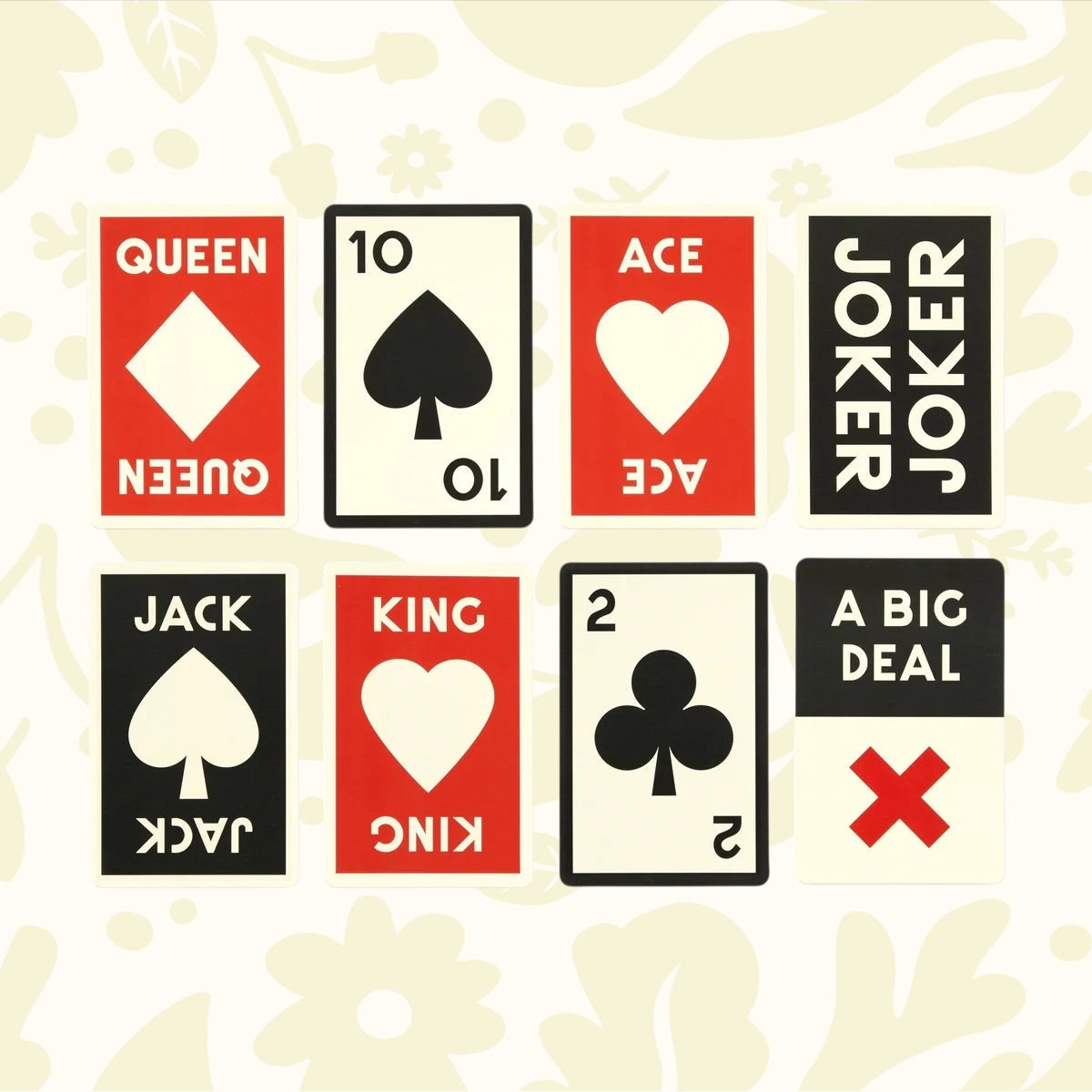Big Deal Giant Playing Cards by Brass Monkey—8 jumbo cards, JOKER & KING included, displayed on a floral cream background.