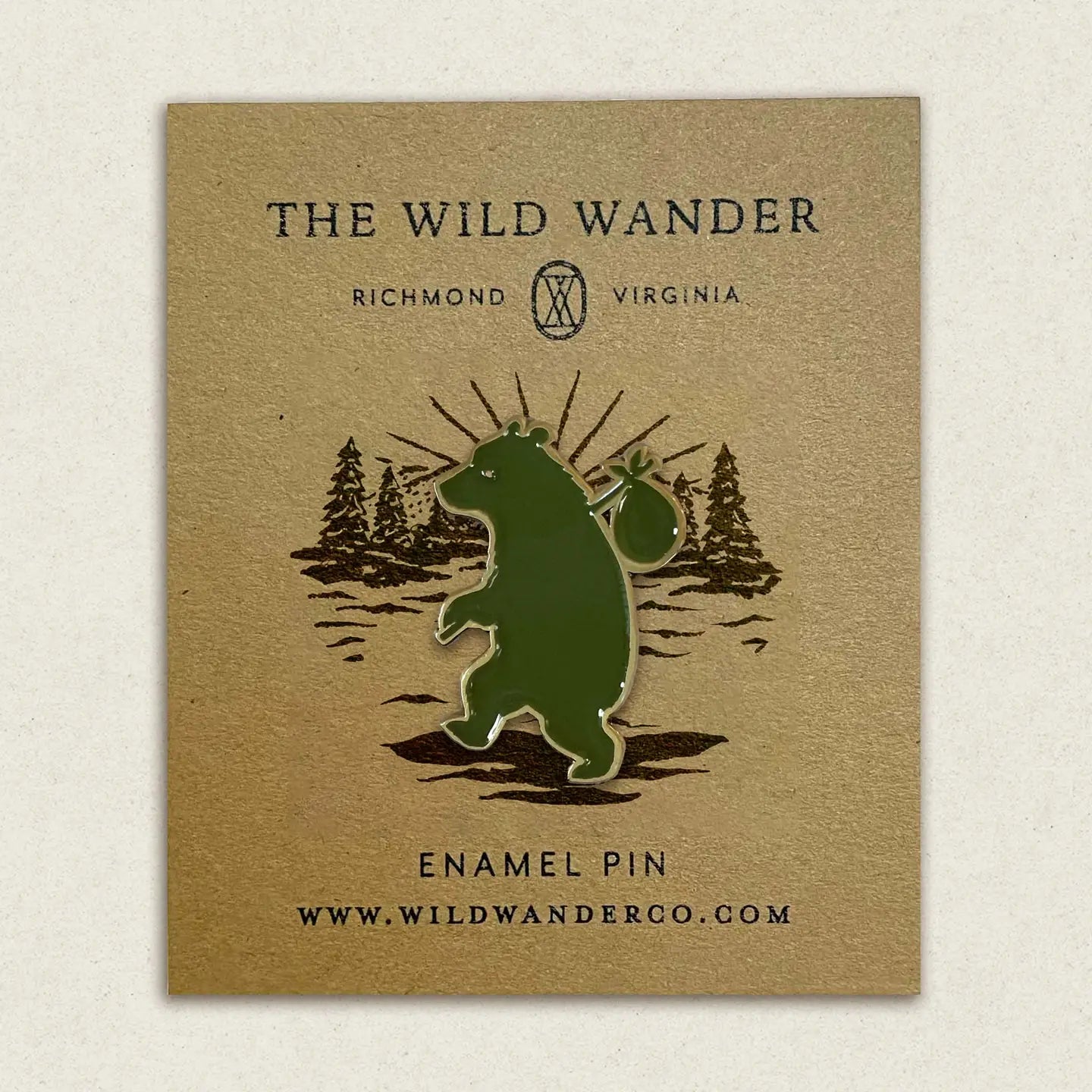 Wandering Bear Enamel Pin by The Wild Wander on forest-themed card; perfect wildlife accessory, collectible, gift idea.