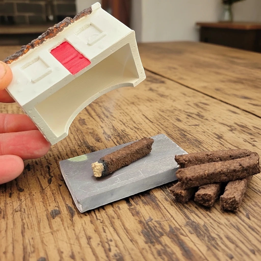 Forager Provisions LTD Aureal Aromatics Irish peat incense sticks with a miniature cottage burner on a wooden table.