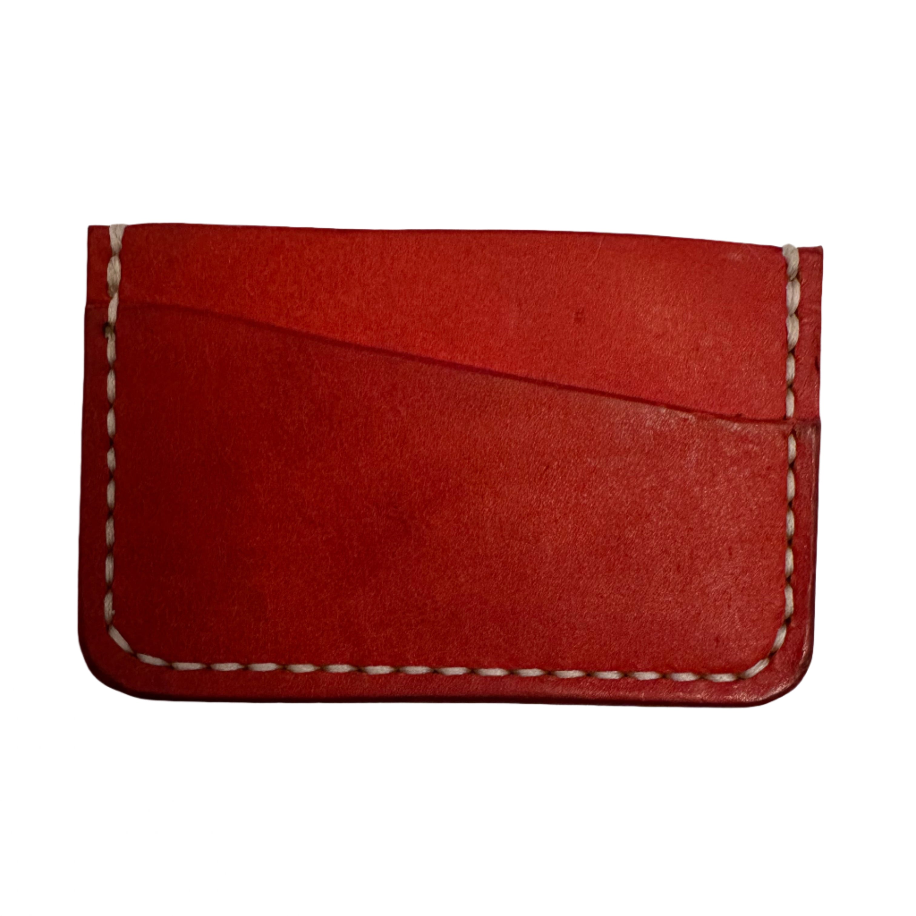 Kjøtt Supply Co Leather 008 card holder in Italian Papavero Red with white stitching displayed on a clean white background.