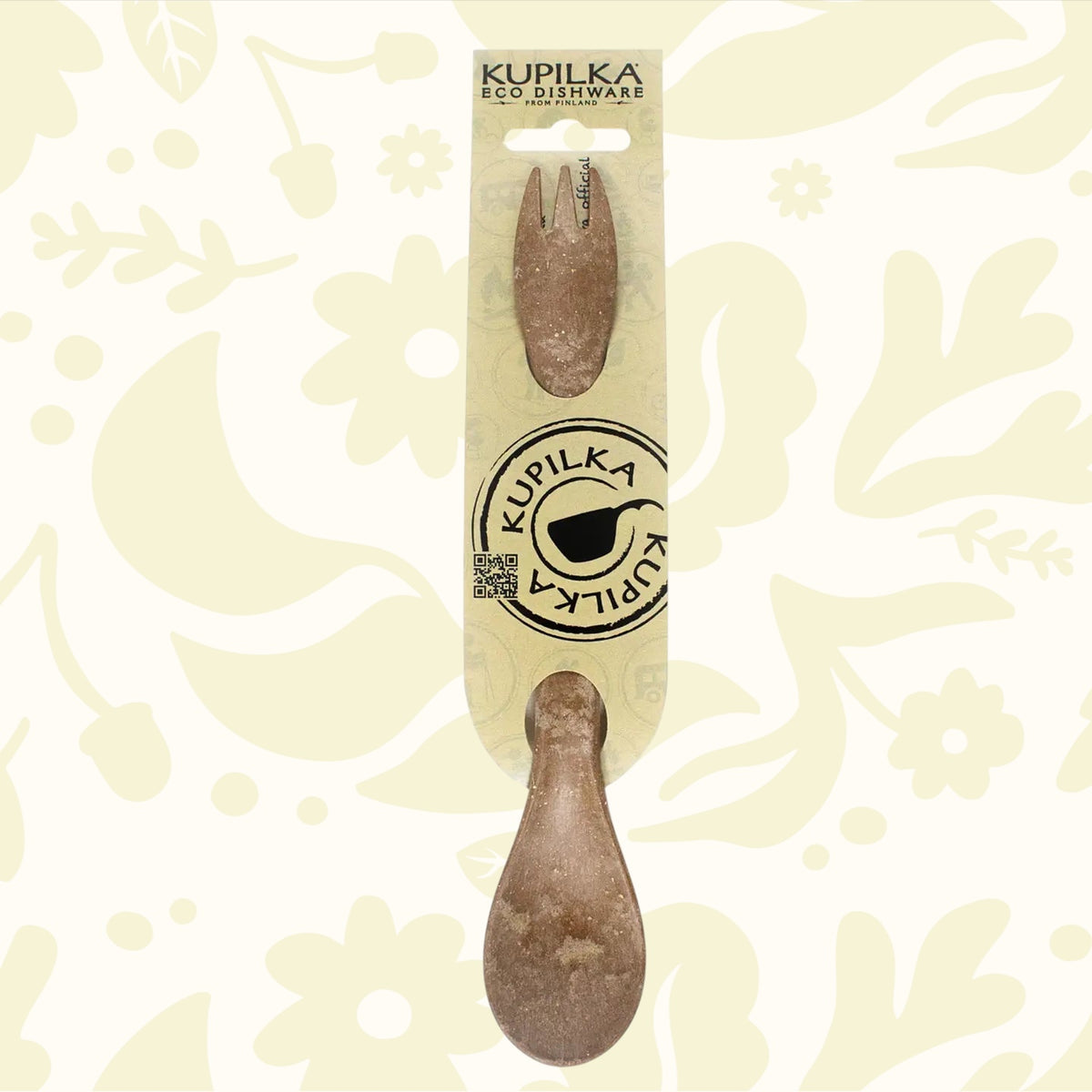 Kupilka Spork 225 Long brown natural fiber utensil on beige card packaging, brand name and logo displayed. Eco-friendly camping gear.