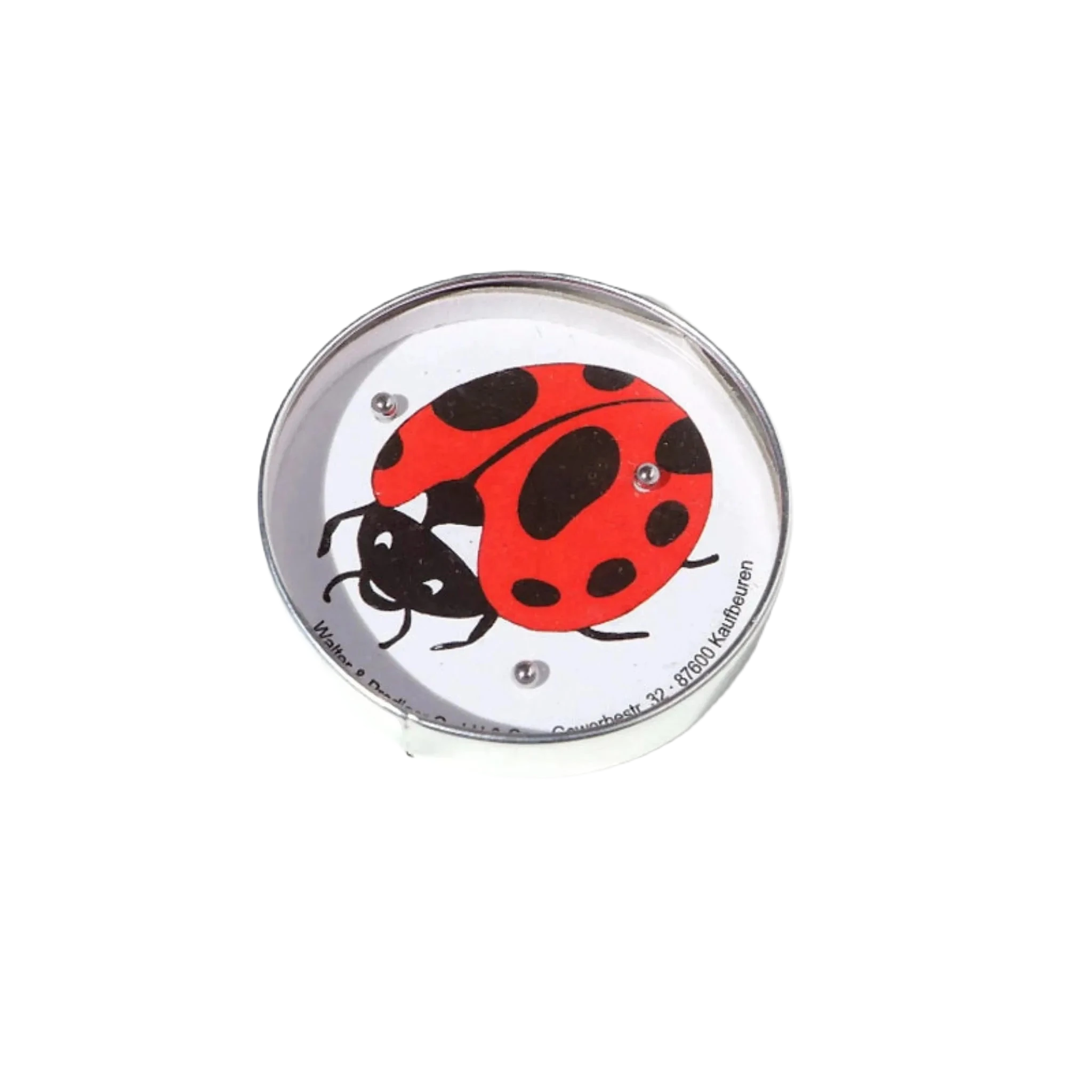 The Die Blechfabrik e.K Ladybird Puzzle Ball Maze features a circular design with an illustration of a red and black ladybug, held securely by small steel balls. This handmade game is perfect for puzzle enthusiasts, offering hours of engaging fun.