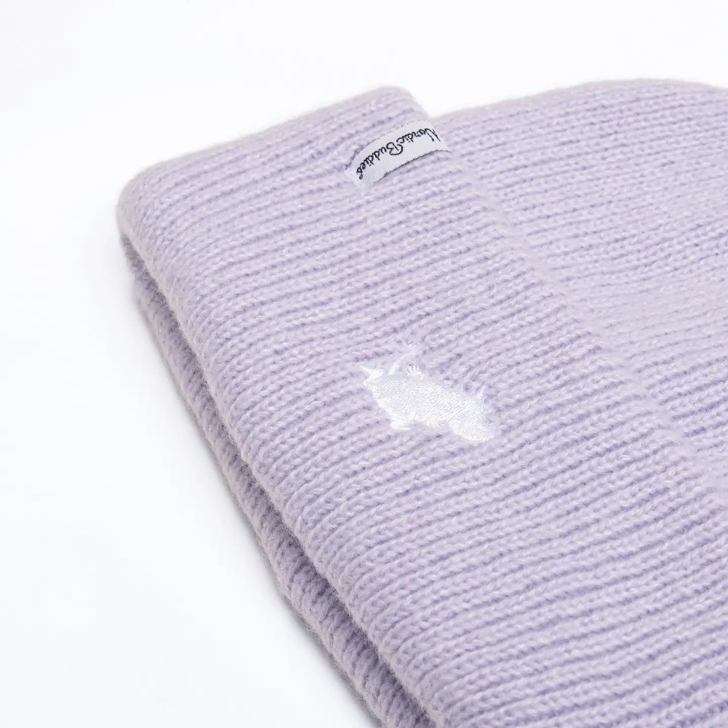 Lilac Nordicbuddies Moomin Beanie, Winter Classics, features white embroidered logo & tag. Trendy cozy hat for winter style.