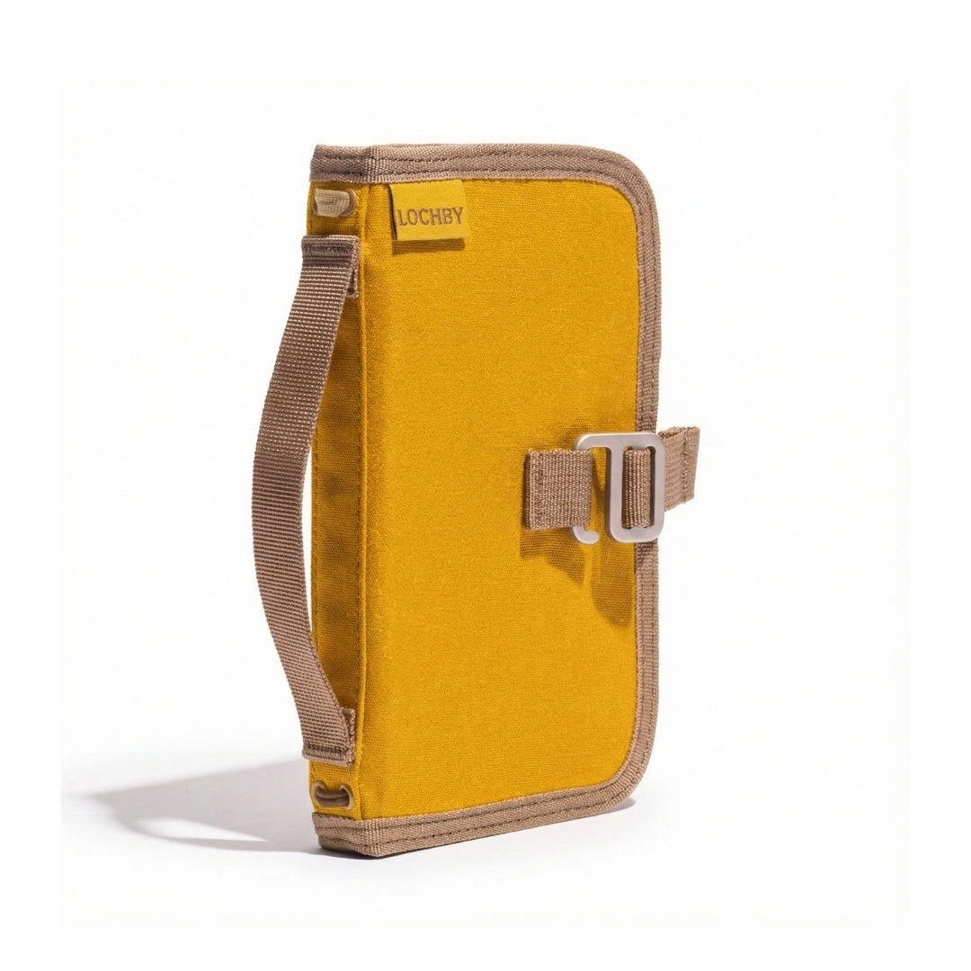 Forager Provisions LTD Lochby Mini Field Journal in mustard waxed canvas with a side handle and metal buckle closure.