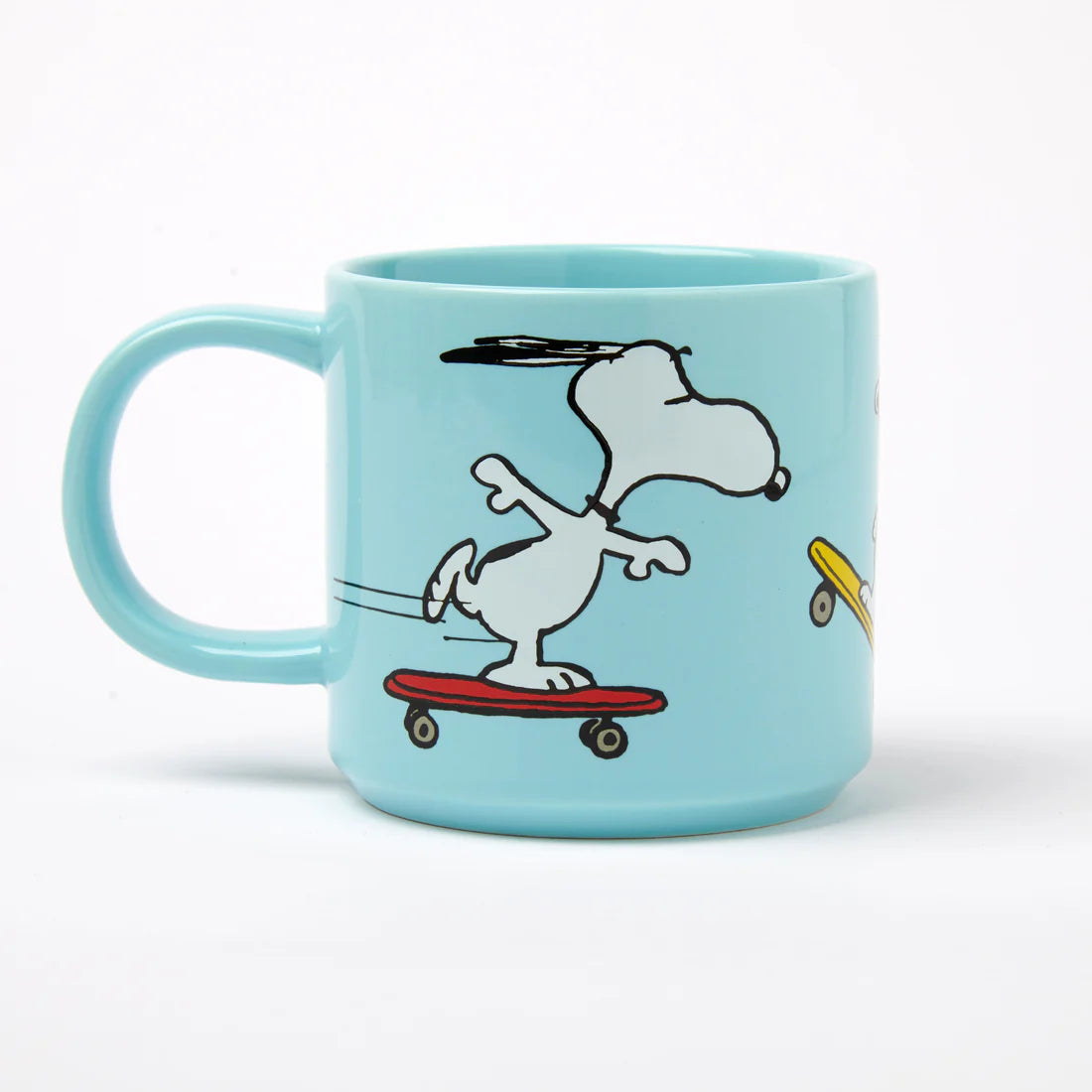 The Magpie Gifts Snoopy Blue Mug shows Snoopy on a skateboard—perfect Peanuts gift for fans, collectors, and coffee lovers.