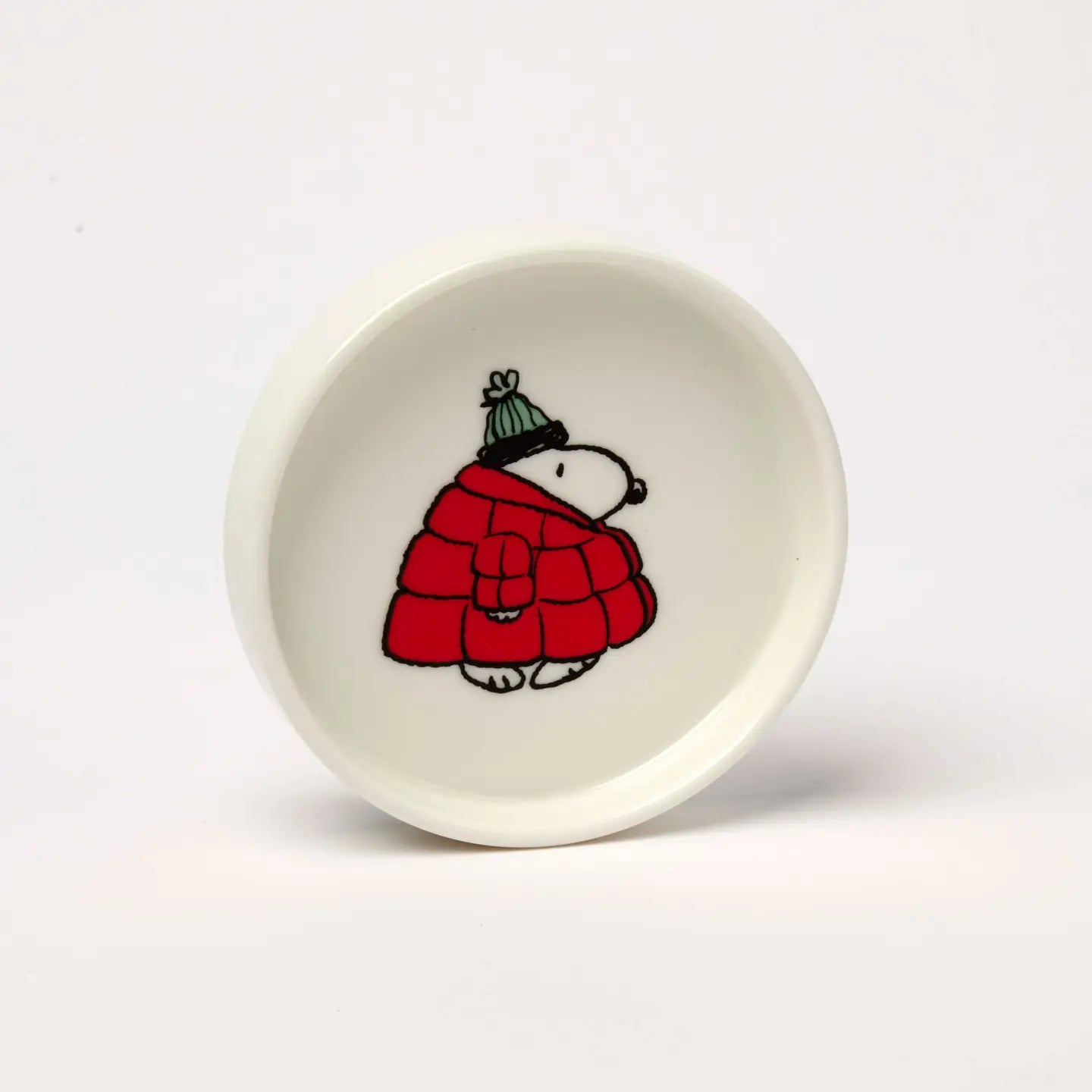 Snoopy trinket dish by Magpie Peanuts, features Snoopy in red puffy coat & green winter hat, perfect for jewelry storage.