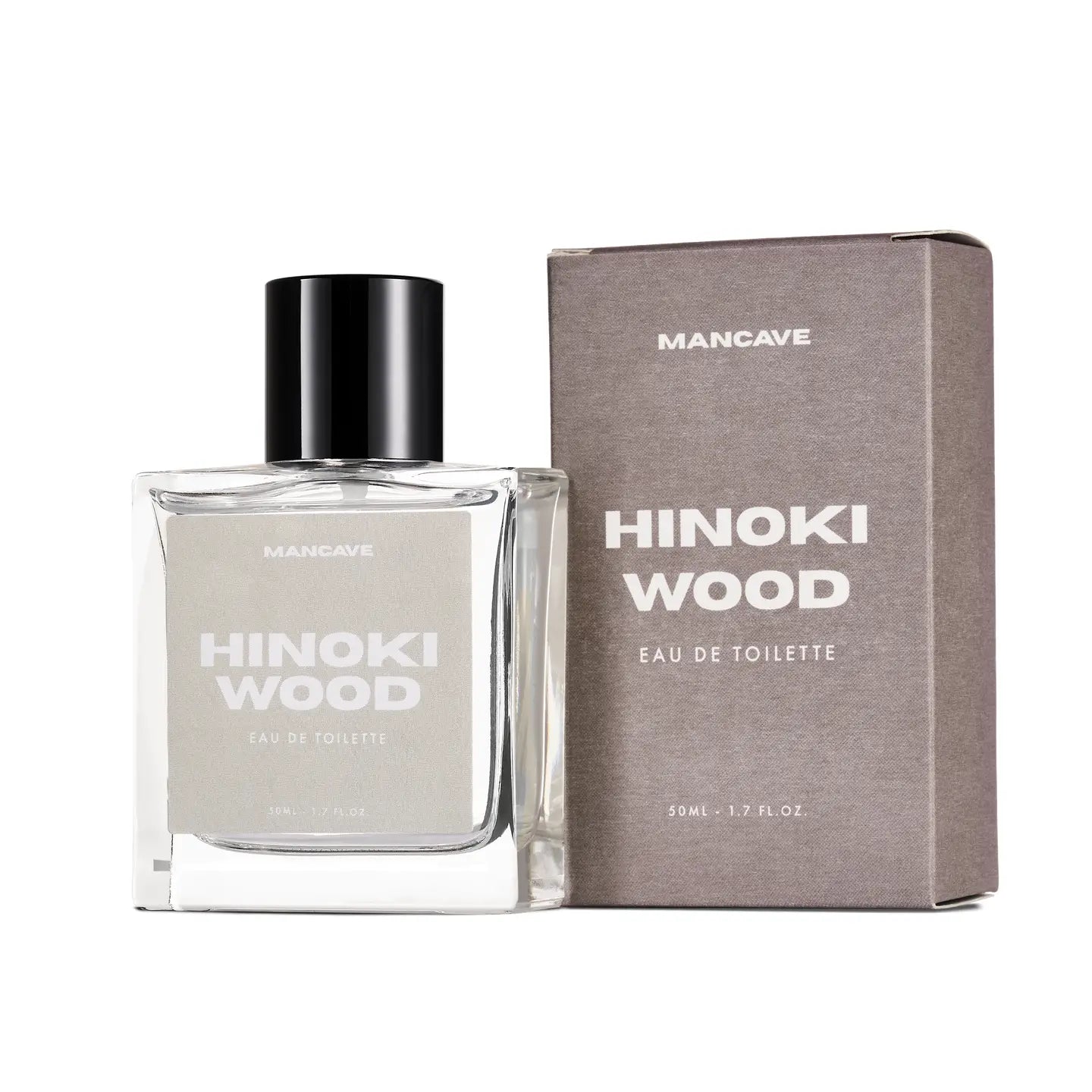 ManCave Hinoki Wood Eau De Toilette Spray 50ml clear bottle next to gray box; premium men's fragrance, elegant packaging.