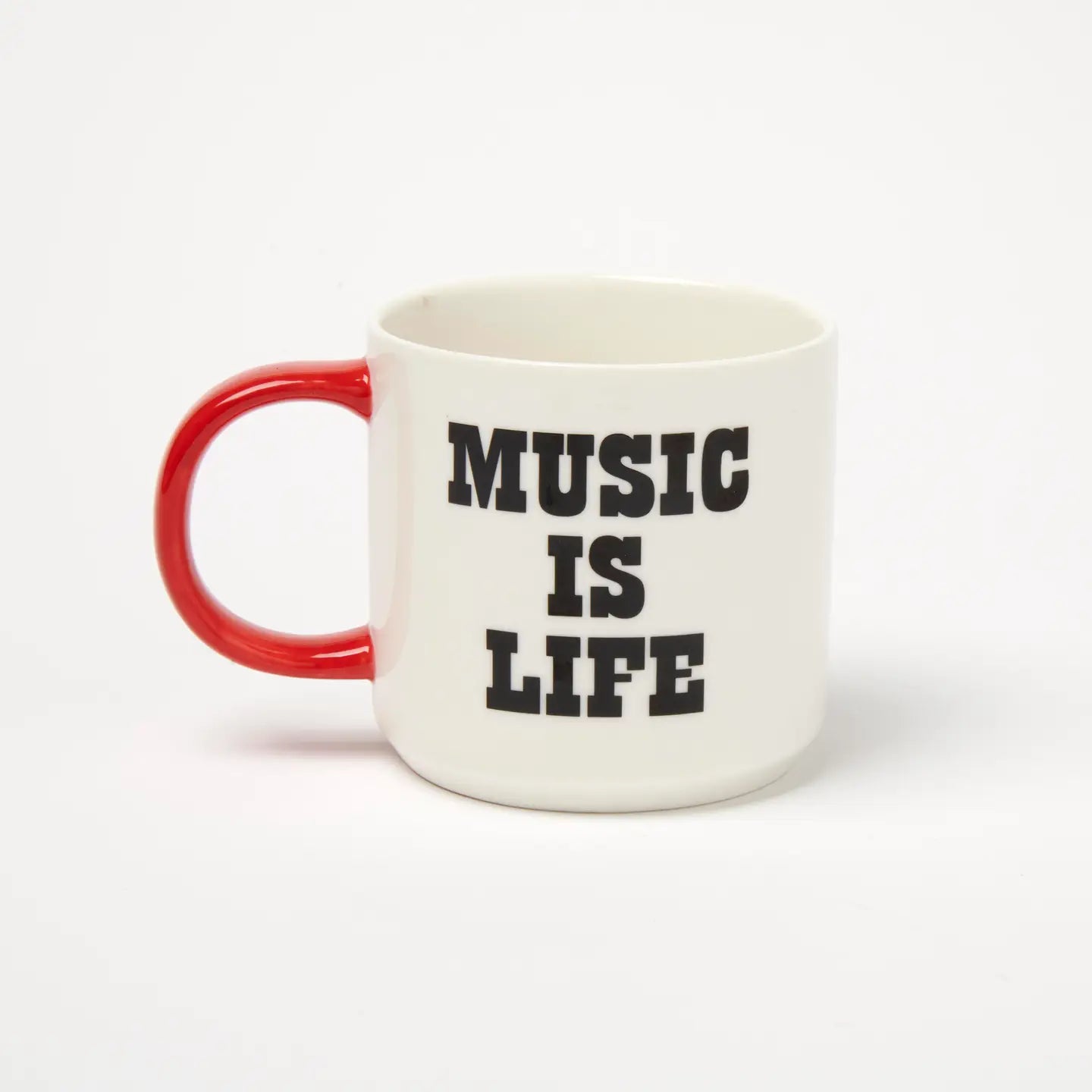 Magpie Gifts Peanuts Music Is Life mug in white with black vinyl font, standout red handle. Perfect gift for music lovers and fans.