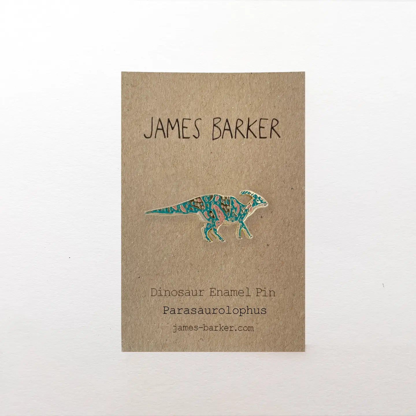 James Barker Parasaurolophus dinosaur enamel pin badge on display card—perfect collectible gift for dino lovers and pin collectors.