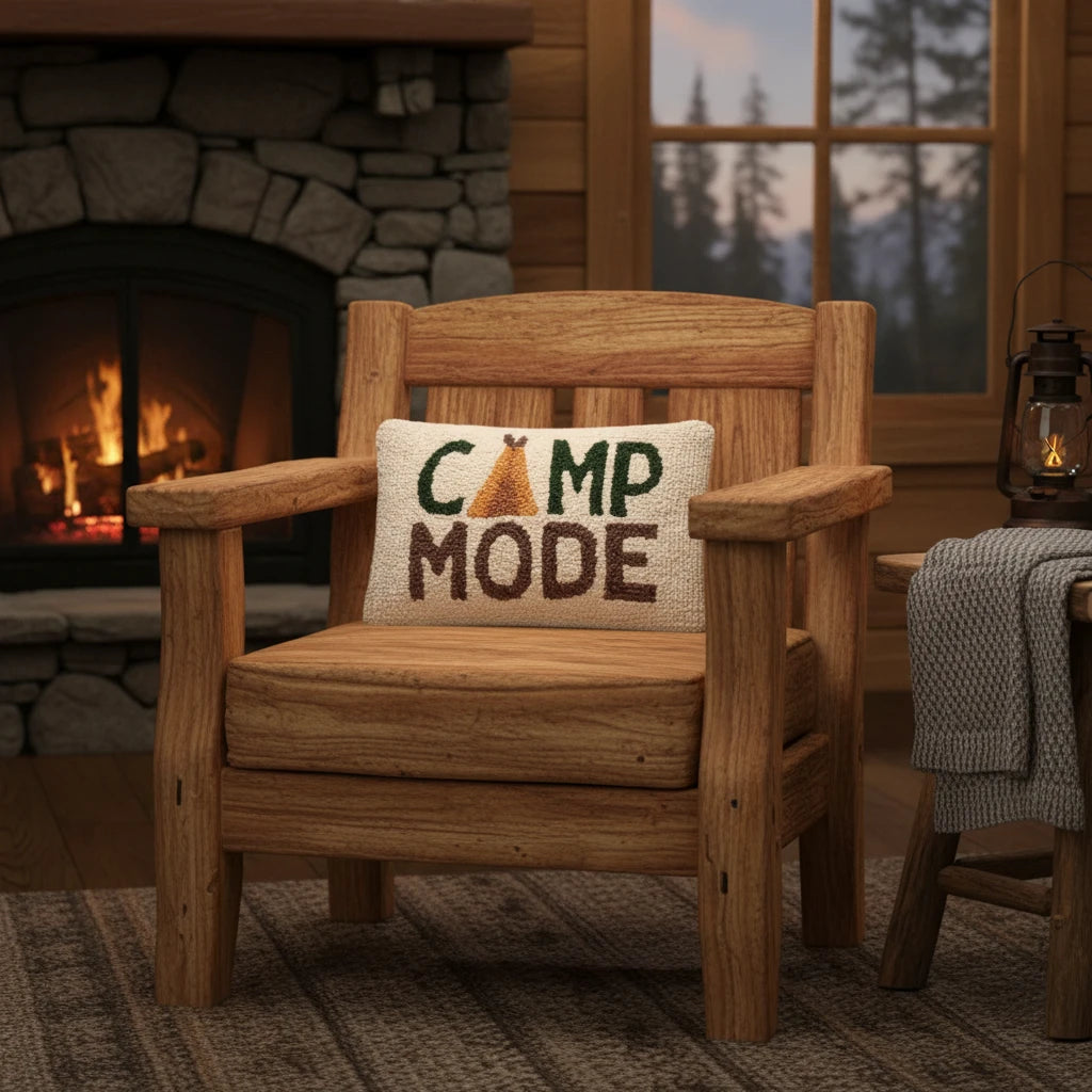 Wood armchair with Peking "Camp Mode" Wool Hook Cushion, 8x12, perfect for cozy cabin or rustic home decor and comfort.