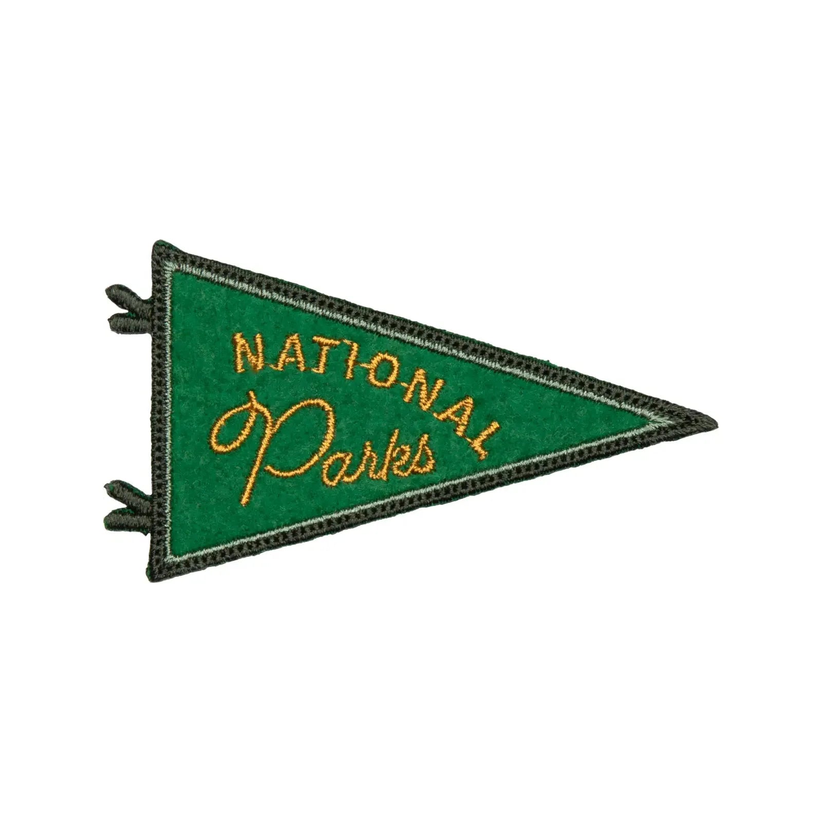 The Landmark Project National Parks Pennant Patch is a collectible iron-on patch featuring a green triangle with "National Parks" written in yellow text, perfect for National Park enthusiasts.