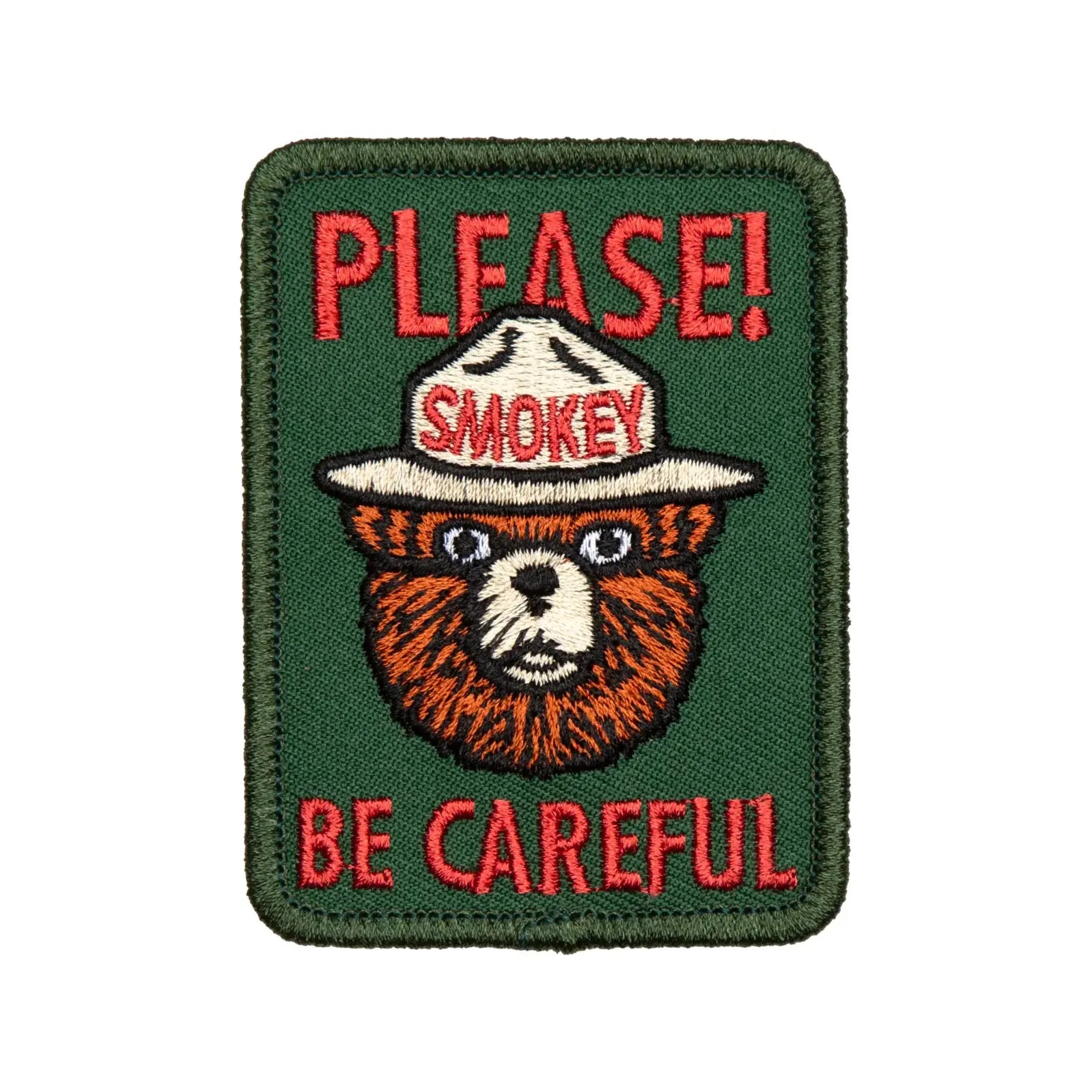 The official licensed "The Landmark Project Smokey Bear Patch - Please Becareful" from the USDA Forest Service features a collectible design of Smokey Bear with the text "PLEASE! BE CAREFUL." above and below him, supporting wildfire prevention education.