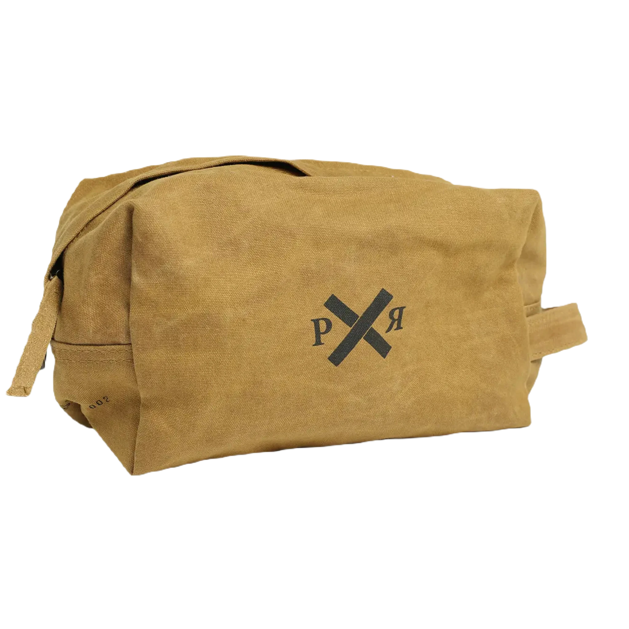 The Pony Rider Slow Road Waxed Canvas Toiletry Bag in Clay is a brown canvas grooming bag featuring a simple black logo with crossed lines and the letters "P" and "R." It includes a convenient handle zip closure and is made in India.