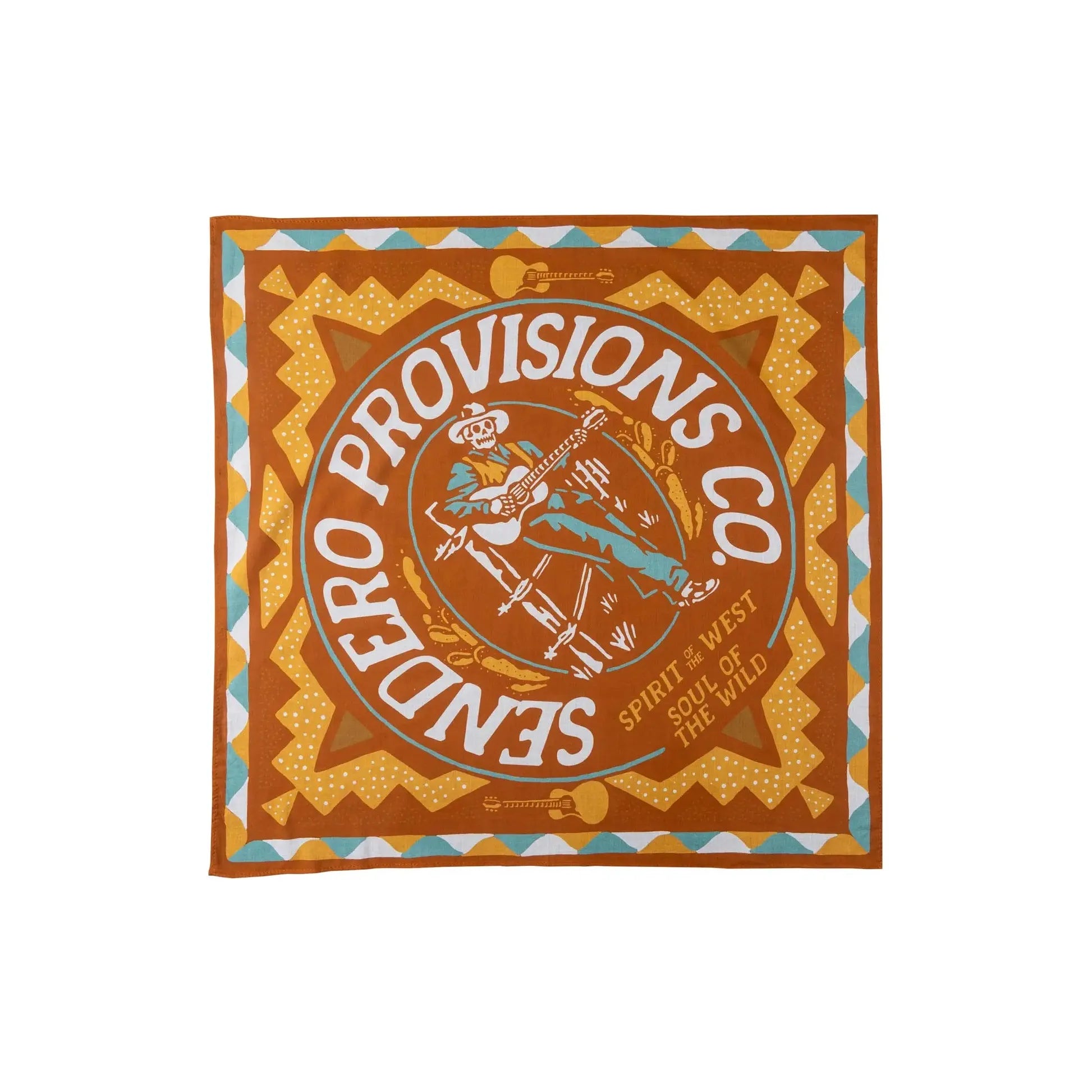 Introducing the Sendero Provisions Still Pickin’ Bandana: a vibrant orange and brown bandana featuring a central oval illustration of an esqueleto cowpoke playing a guitar. The text reads "Sendero Provisions Co. Spirit of the West, Soul of the Wild." Proudly made in Mexico.