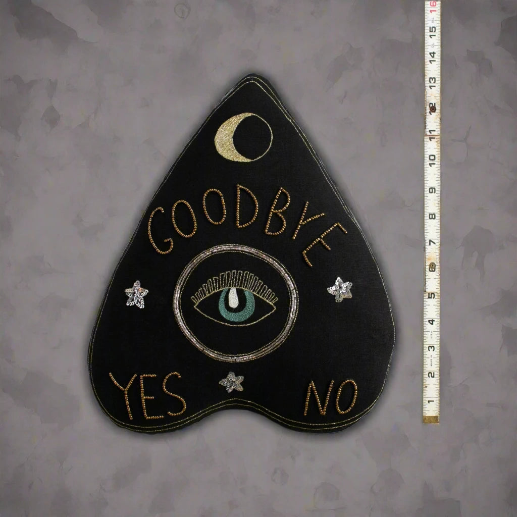 Black Skippy Cotton Ouija Board Pillow—heart-shaped gothic decor; mystical throw pillow with ruler for size reference.