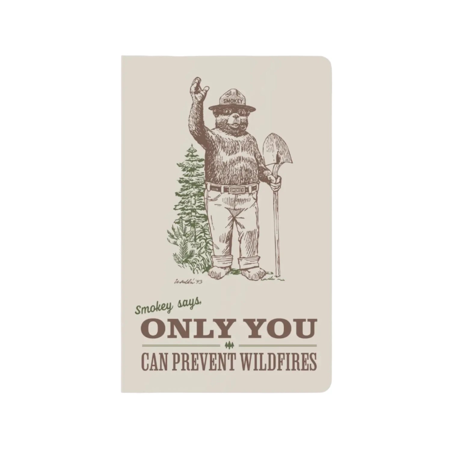 A notebook featuring an image of Smokey Bear waving infront of a fir tree while holding a spade.
