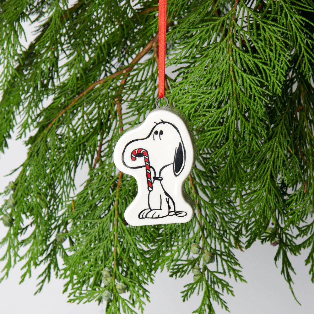 Snoopy Christmas bauble with candy cane, red ribbon—perfect Magpie gift for Peanuts fans and festive holiday décor lovers.