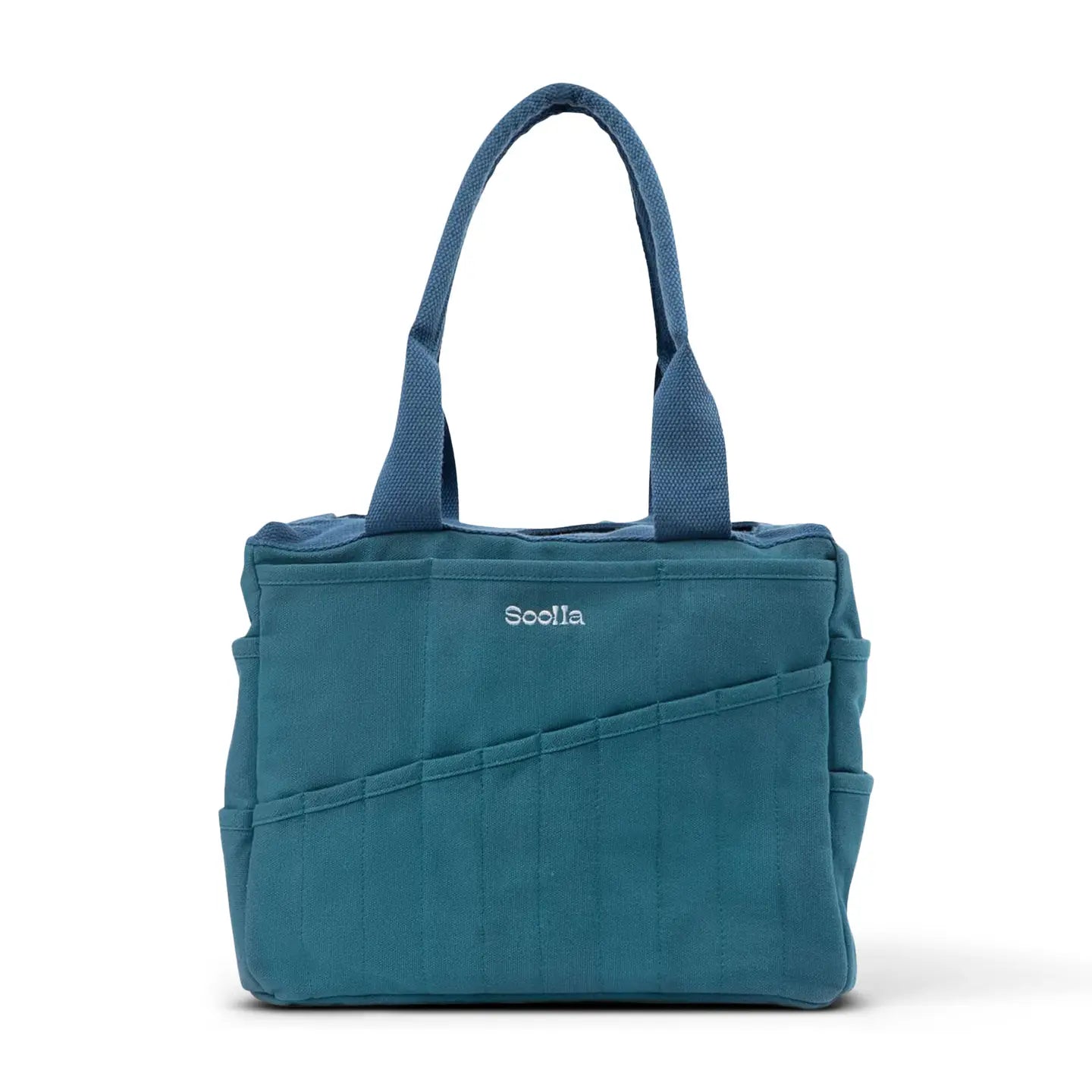 Soolla Studio Pottery Art Bag, Aquamarine color, exterior pockets, white "Soolla" embroidery. Trendy ceramic-inspired tote.