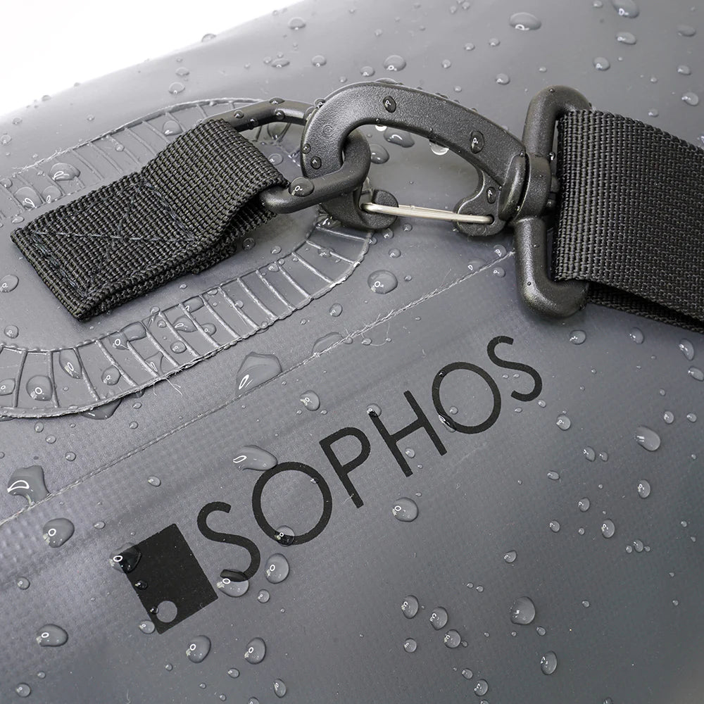 The Sophos Dry Sack Bag 20L Charcoal 500D PVC, featuring a gray waterproof roll-top design and an adjustable black shoulder strap, sits against a plain white background, perfect for adventure seekers.