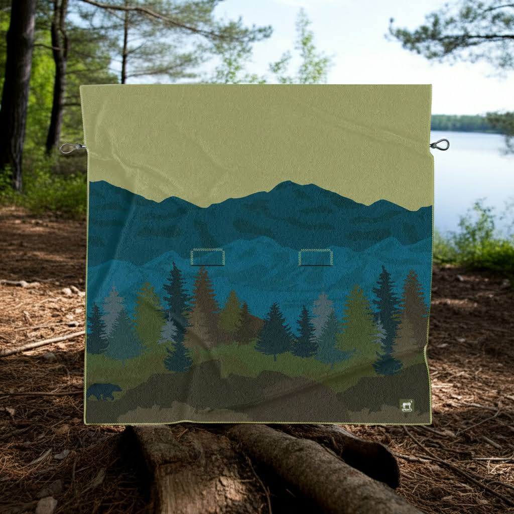 Forager Provisions LTD Sprints Grizzly Guide oversized towel with a forest and bear mountain landscape print