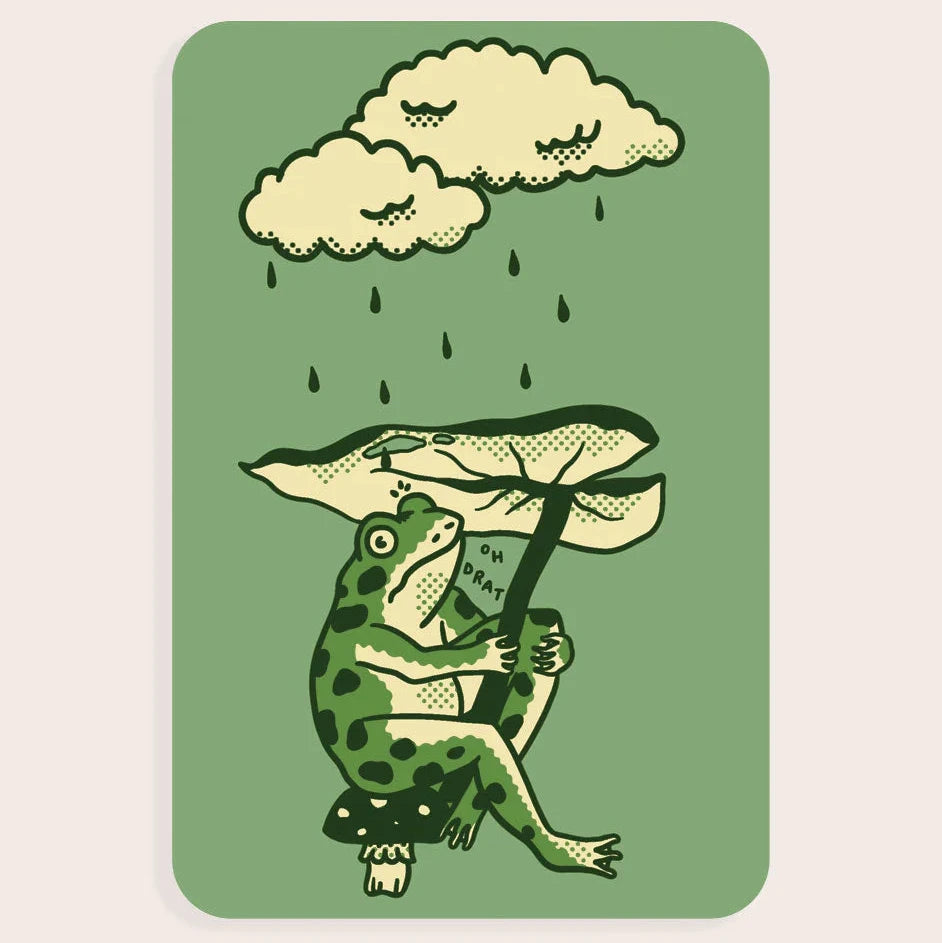 Stay Home Club Leaf Umbrella Vinyl Sticker with cute frog on mushroom, sheltered by leaf—perfect rainy day aesthetic decor.